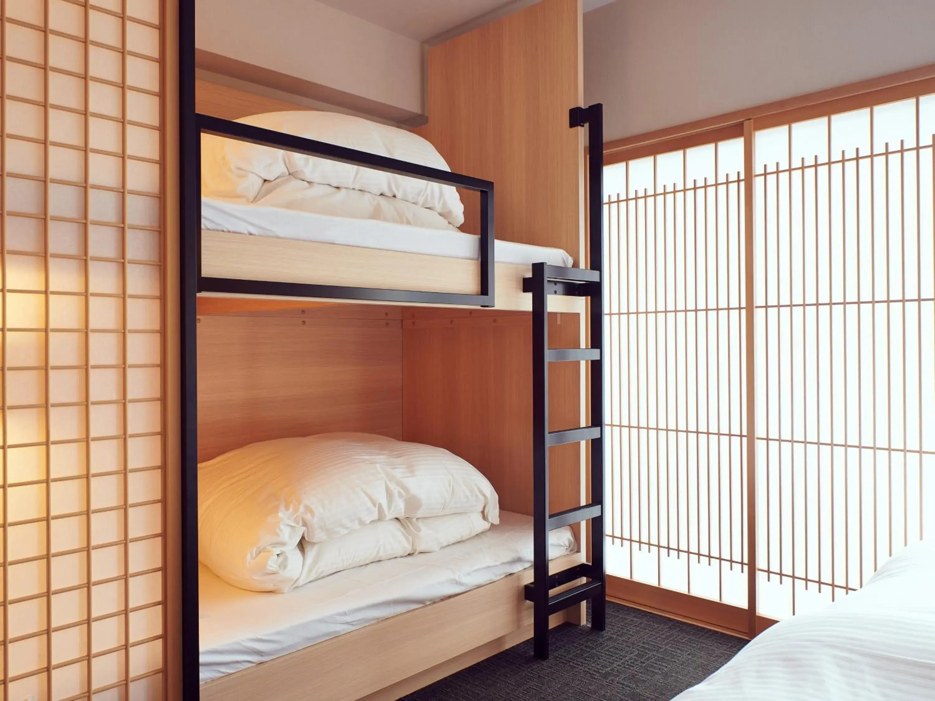 Bed in MIMARU Kyoto Nijo Castle Bed in MIMARU Kyoto Nijo Castle