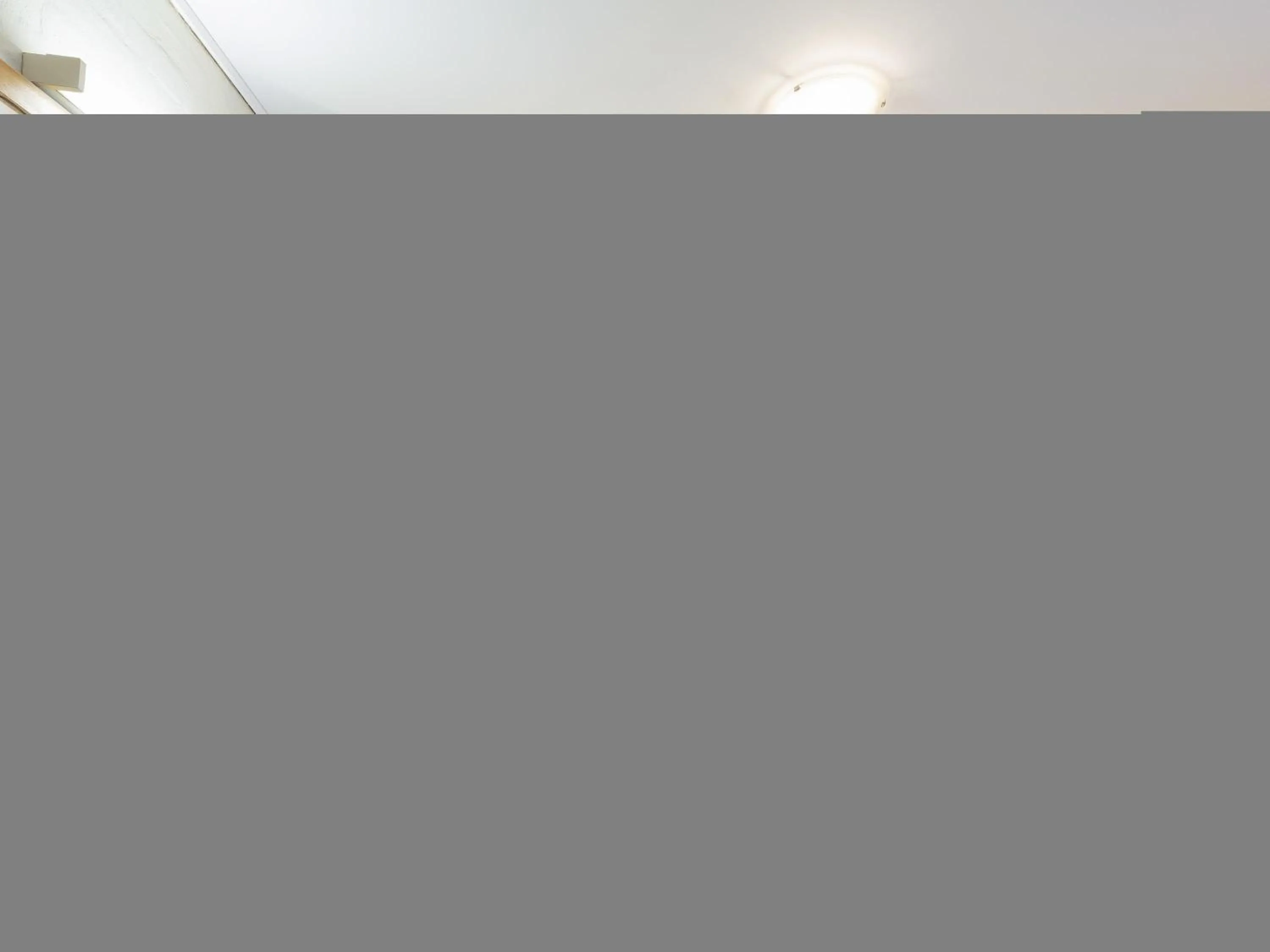 Bedroom in ibis Styles Canberra