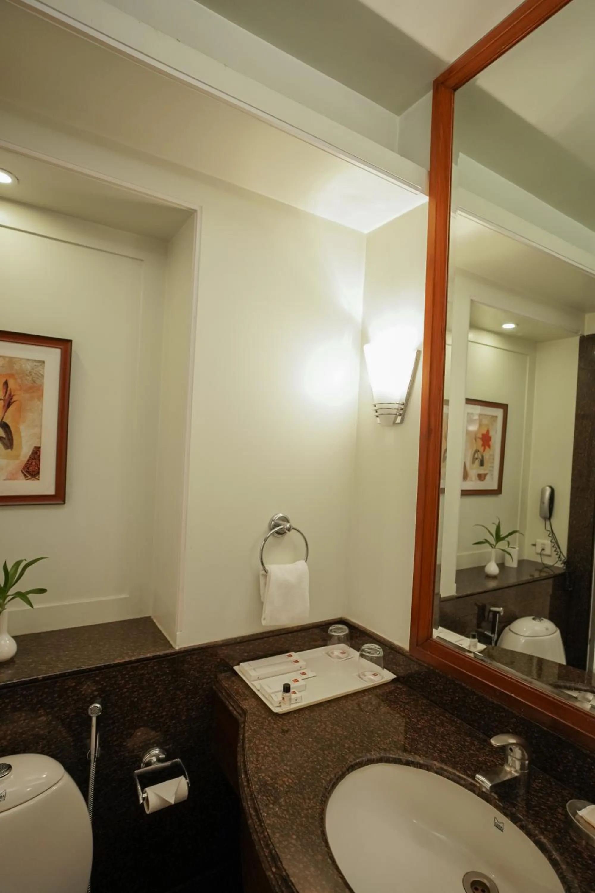 Bathroom in Clarion Bella Casa at Airport