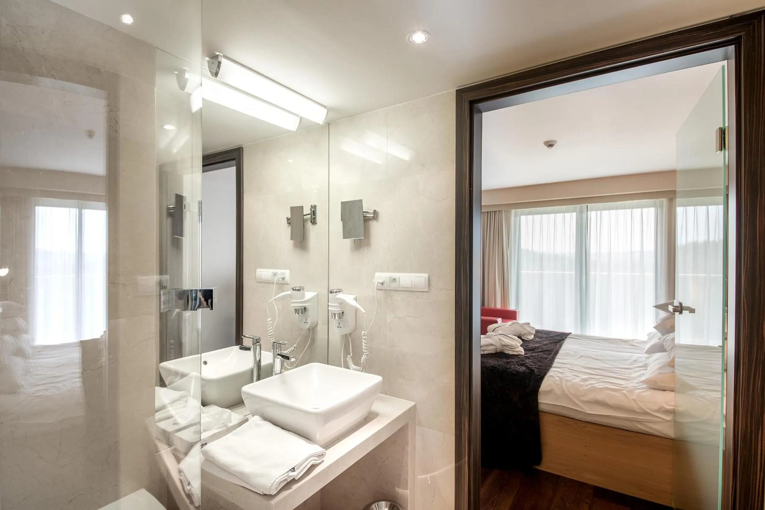Bathroom, Bed in Hotel BUKOVINA