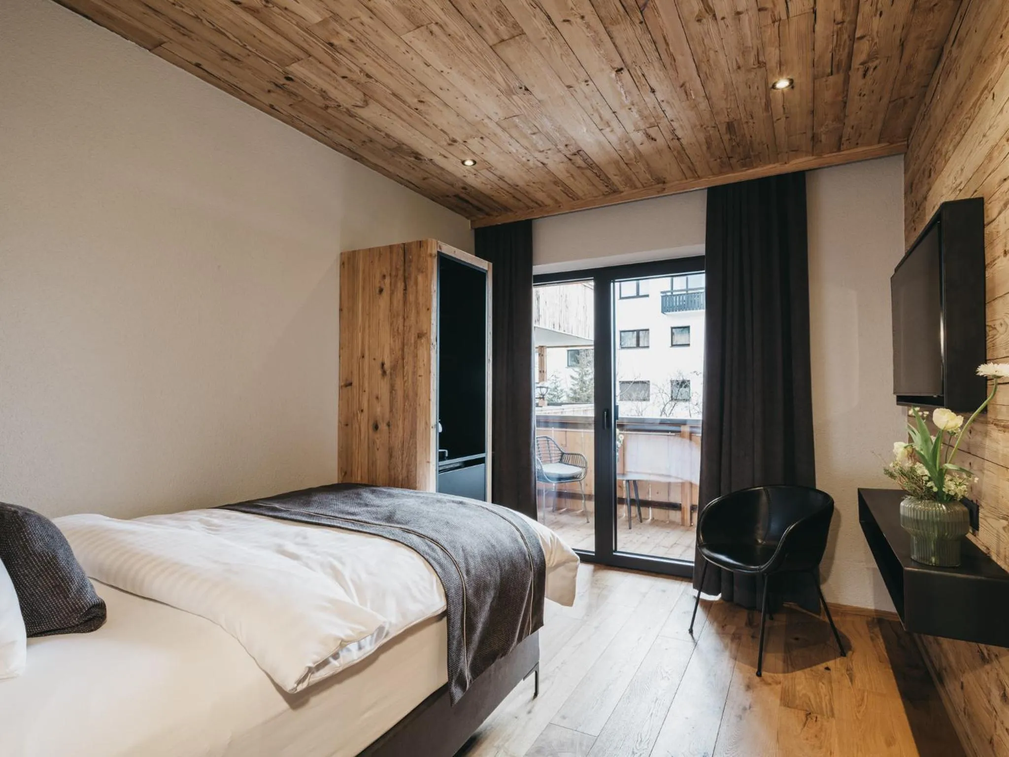 Photo of the whole room, Bed in VAYA Seefeld