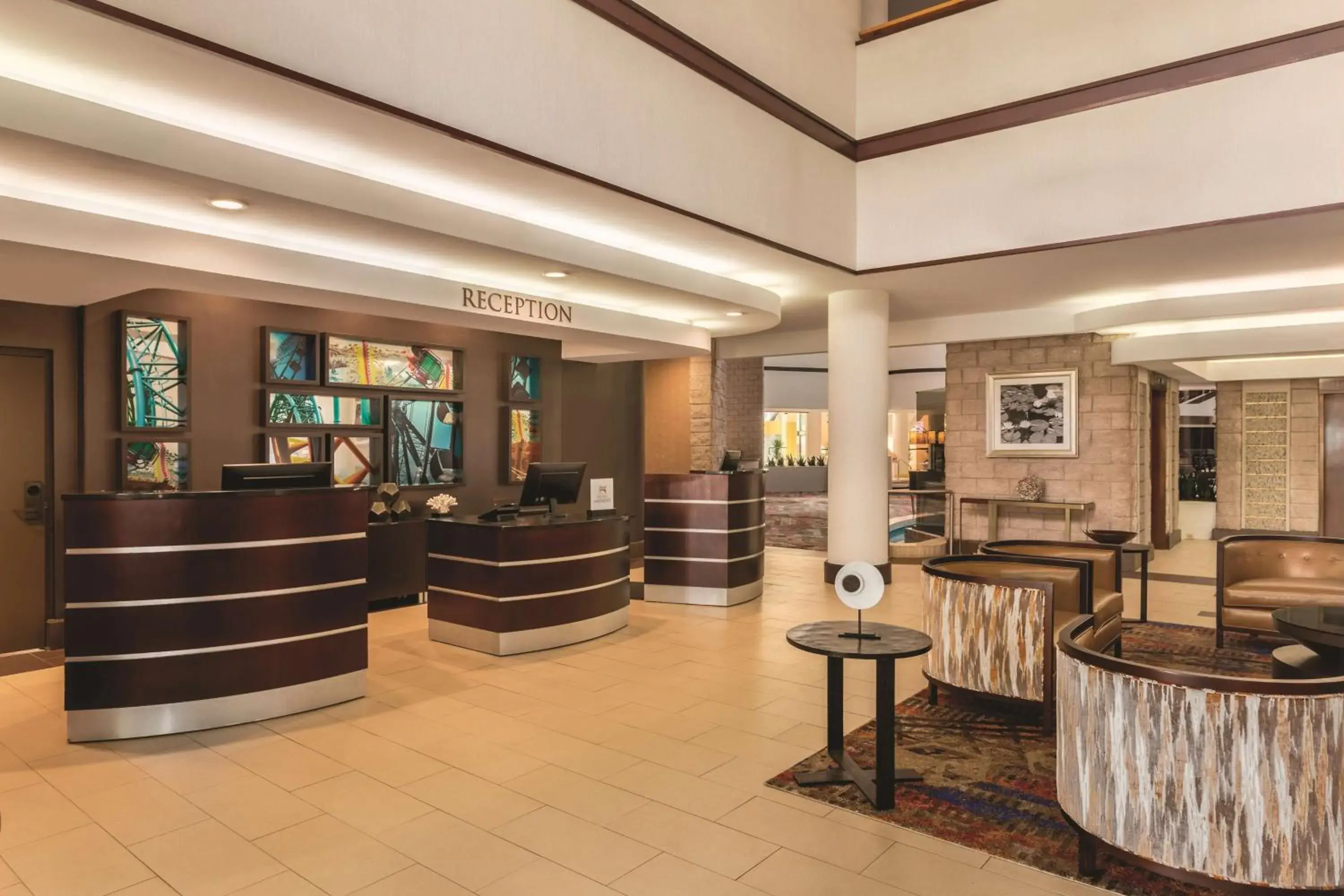 Lobby or reception in Embassy Suites by Hilton Orlando International Drive ICON Park Lobby or reception in Embassy Suites by Hilton Orlando International Drive ICON Park