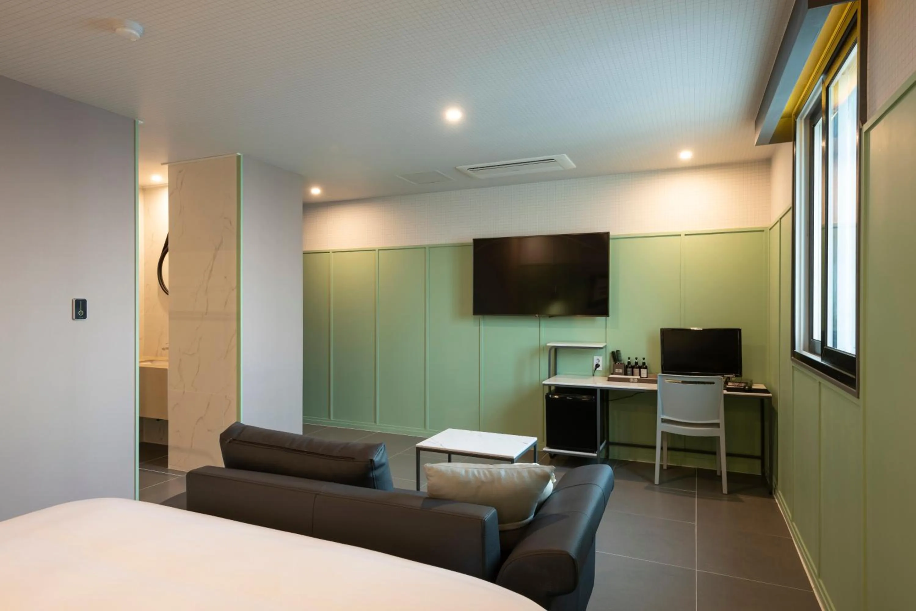 Bed in Brown-Dot Hotel Gupo