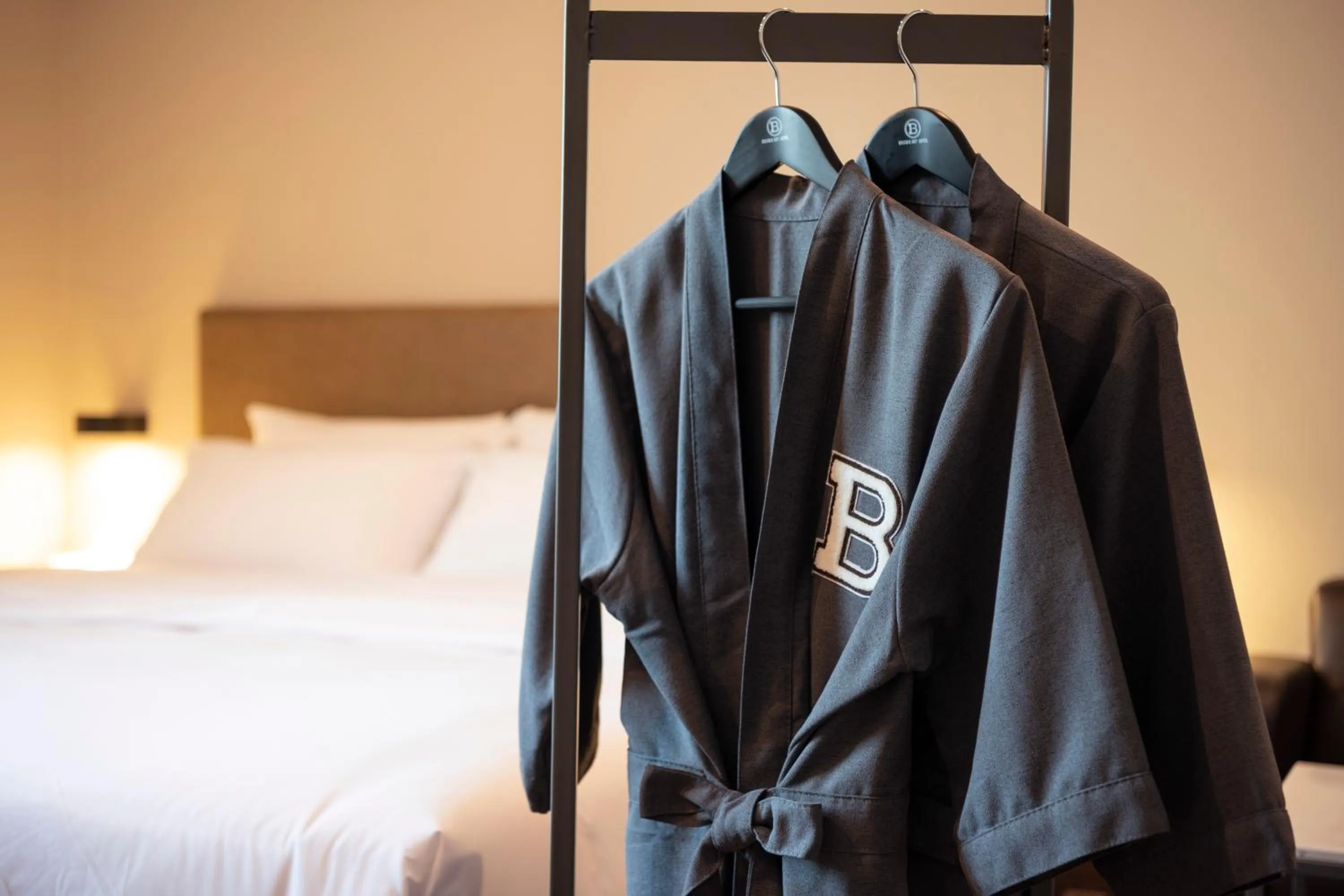 Bed in Brown-Dot Hotel Gupo