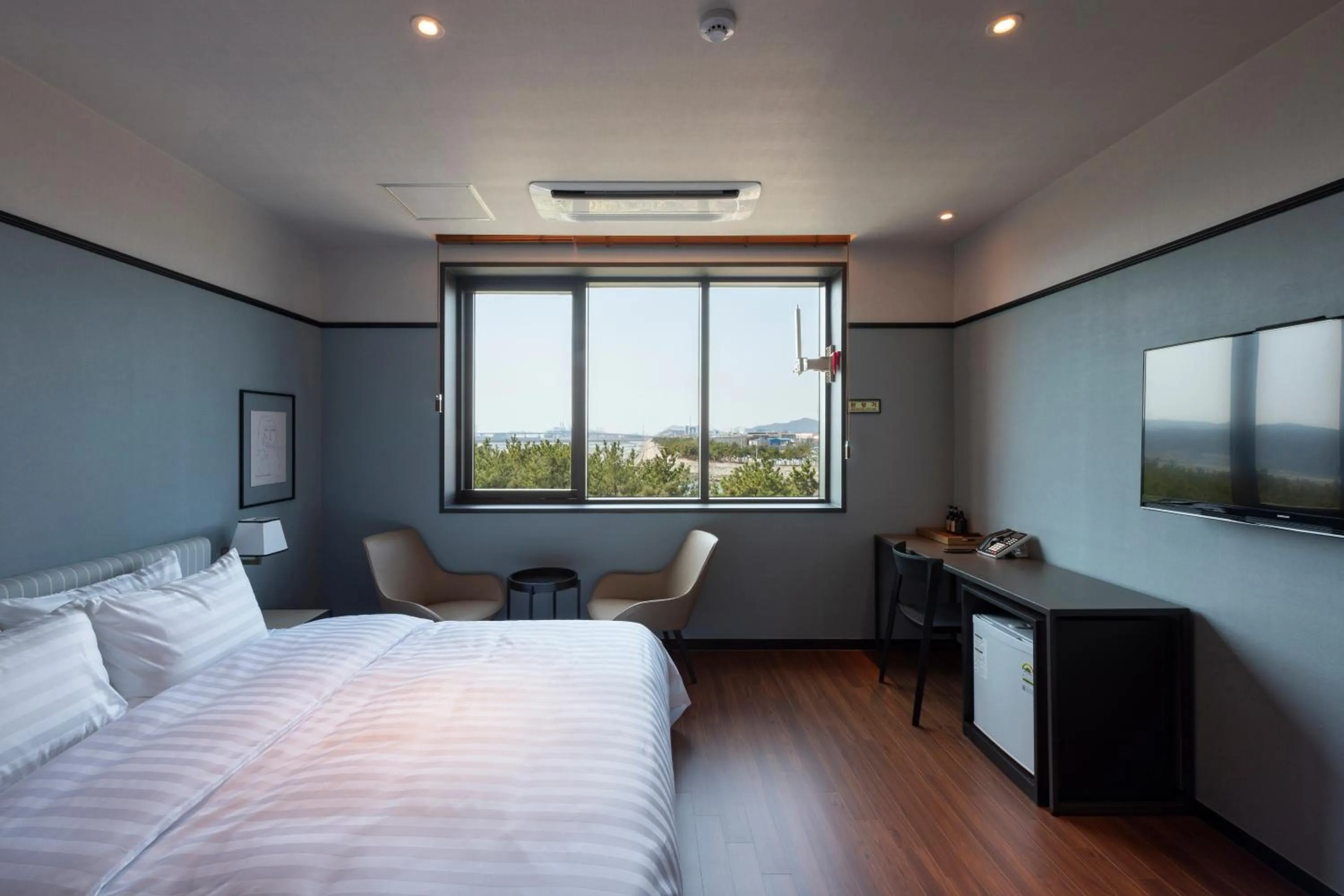 Bed in Brown-Dot Hotel Shinho