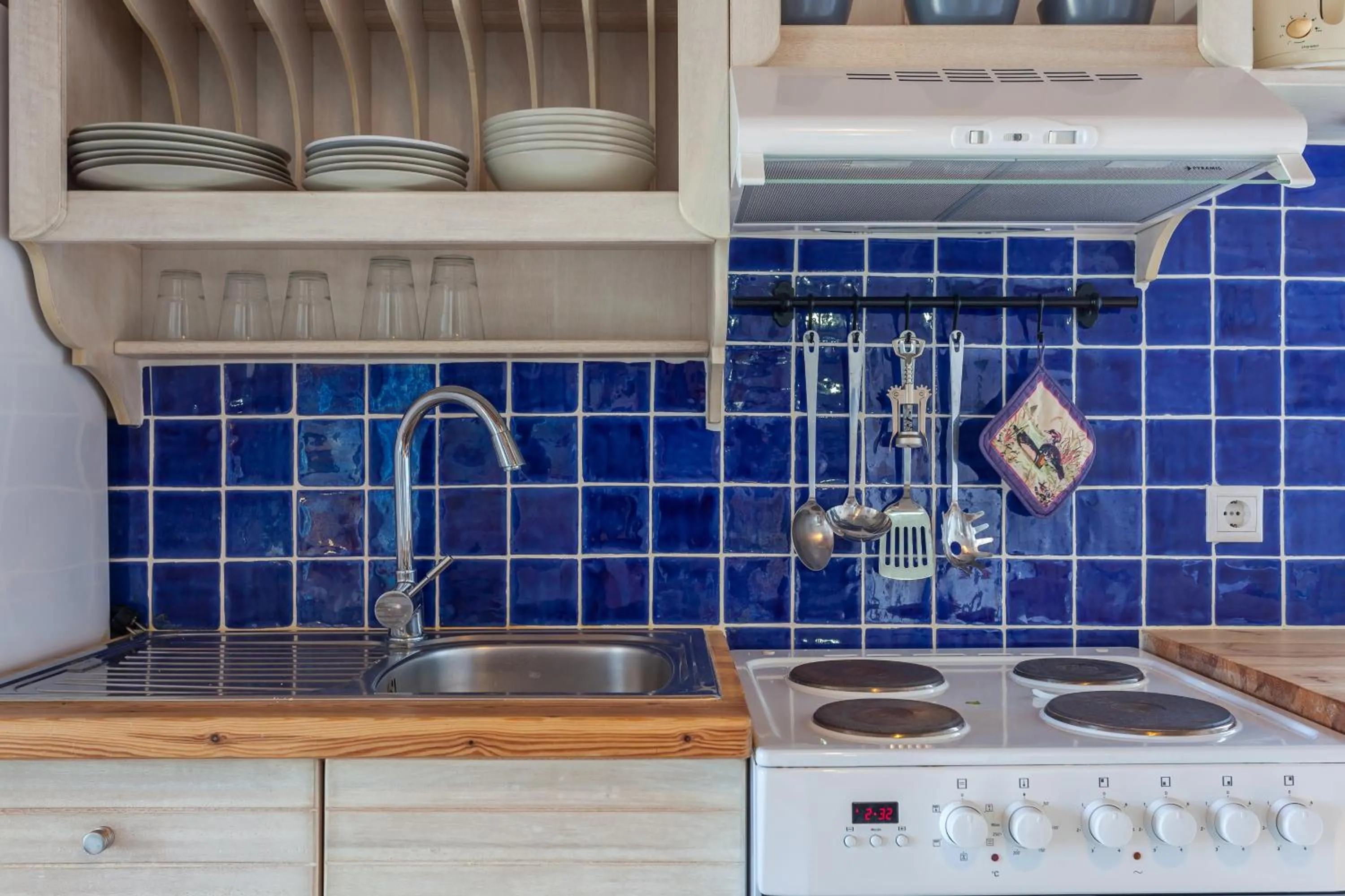 Kitchen or kitchenette in Thea Home Hotel by Booking Kottas