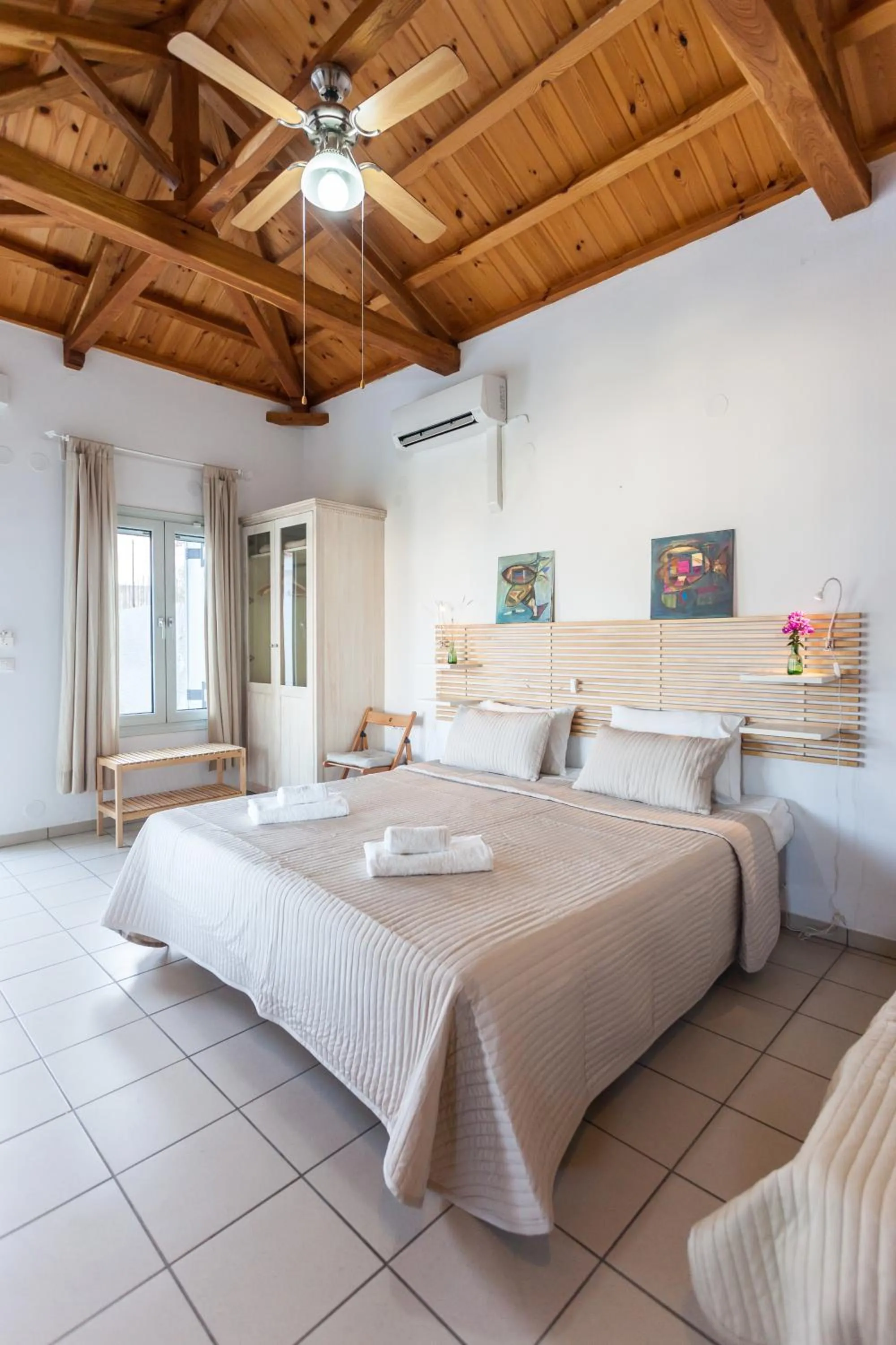 Bed in Thea Home Hotel by Booking Kottas