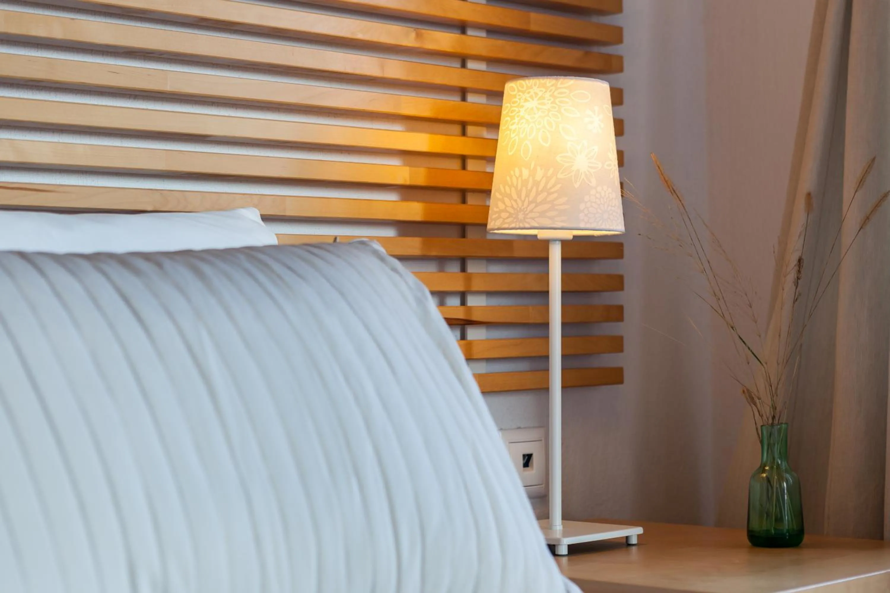 Decorative detail, Bed in Thea Home Hotel by Booking Kottas