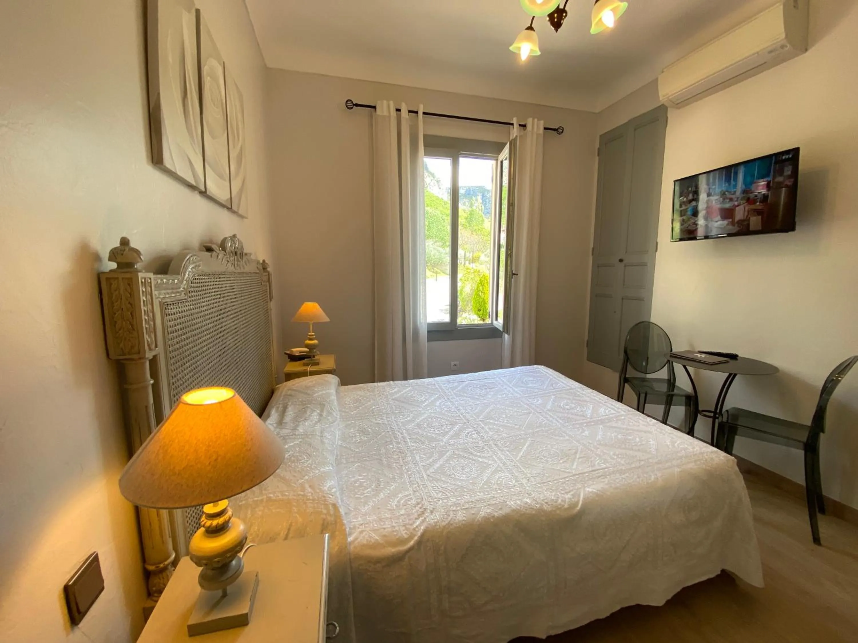 Photo of the whole room, Bed in Hôtel Le Colombier