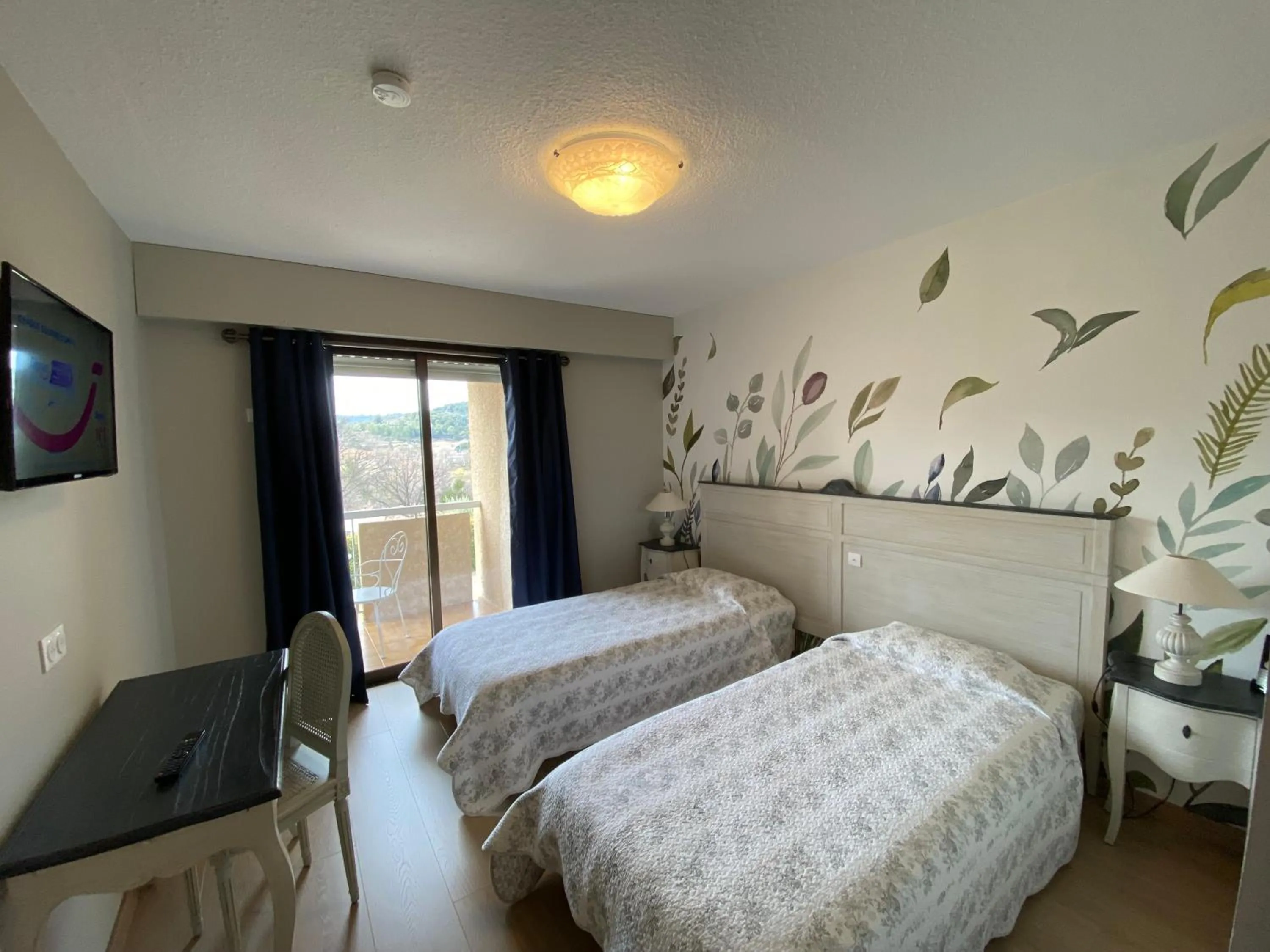 Bed in Hôtel Le Colombier