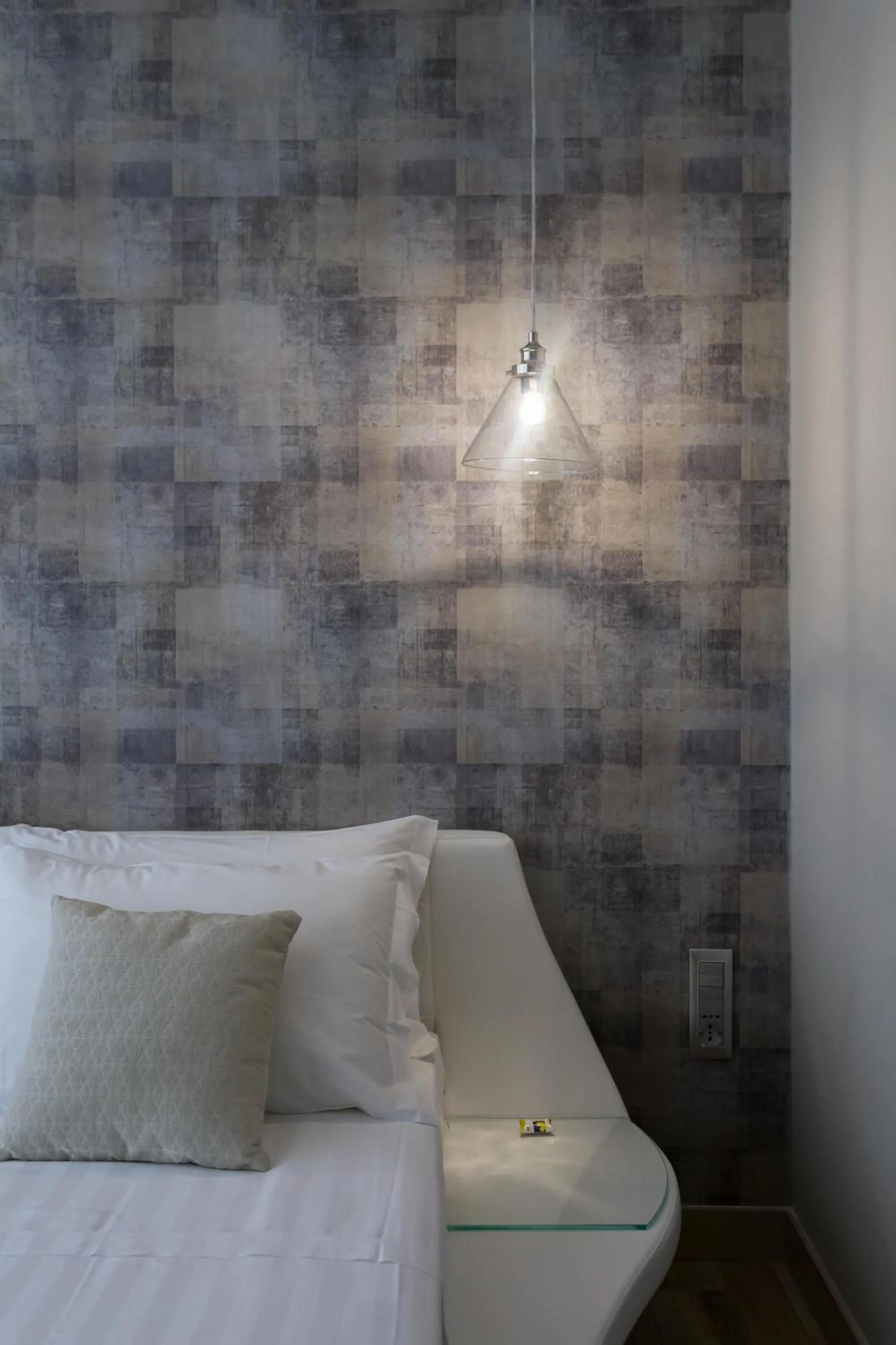 Decorative detail, Bed in ApartHotel Durini