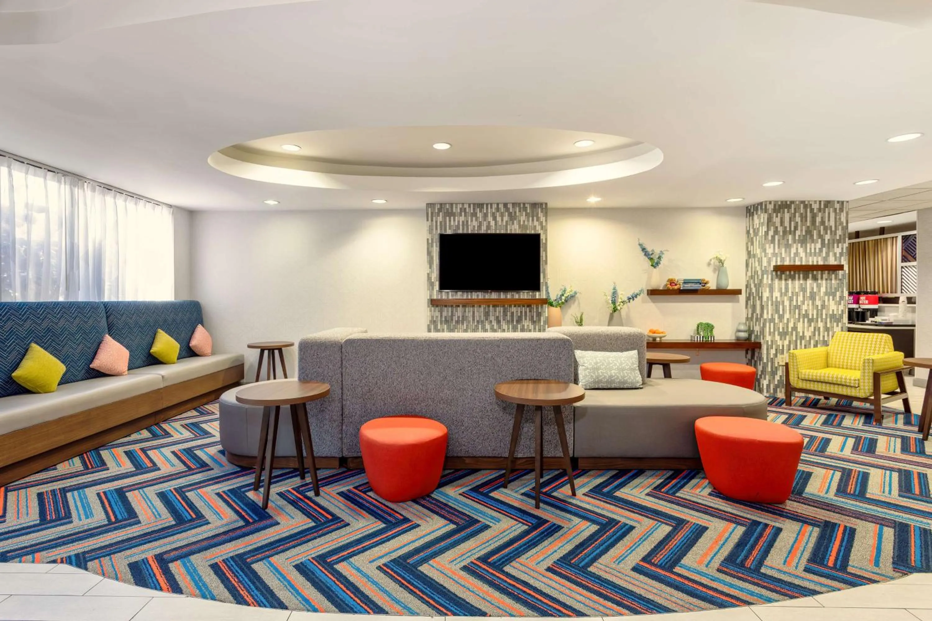 Lobby or reception in Hampton Inn Orlando-International Airport