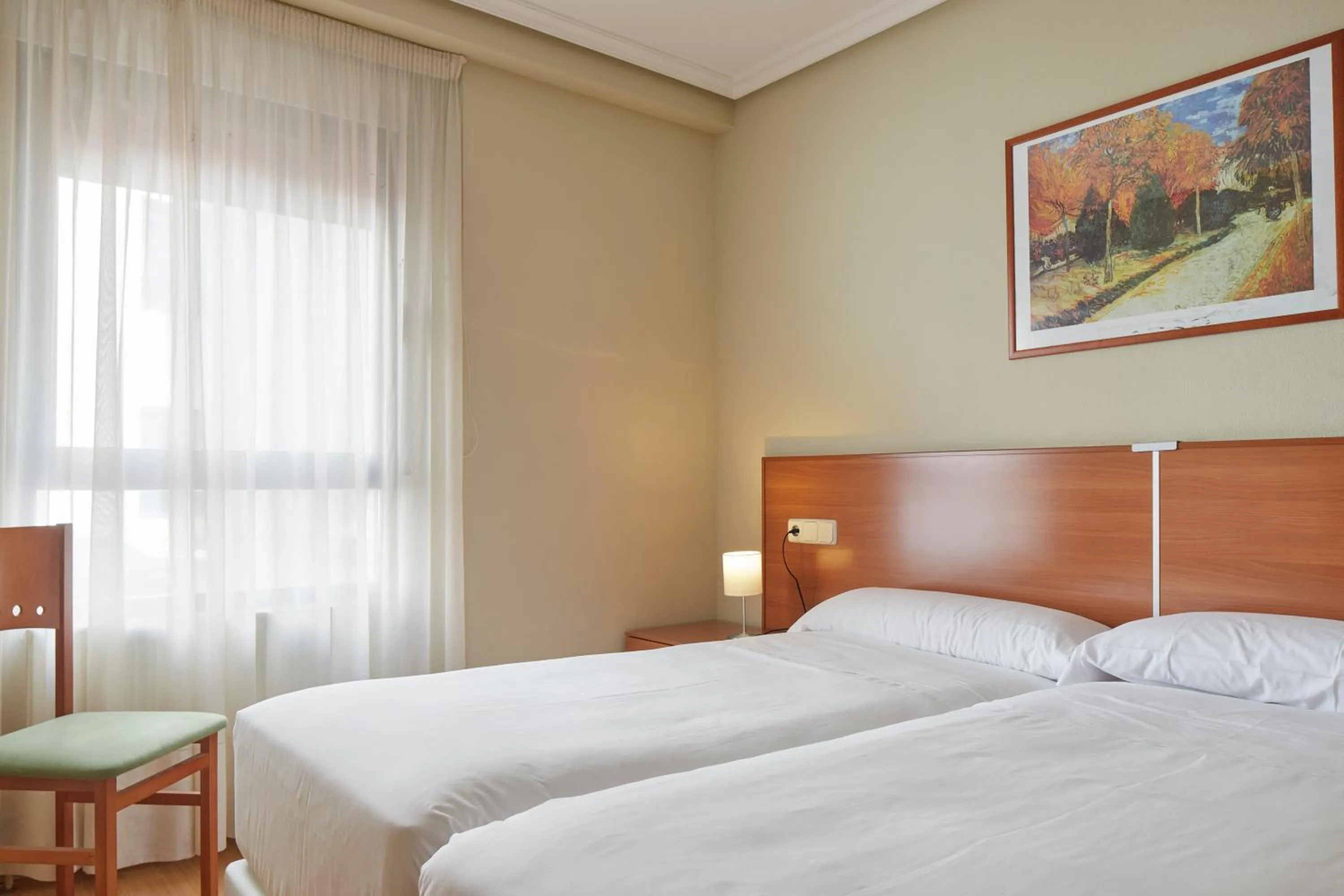 Bed in IRAIPE Achuri Auto Check-in