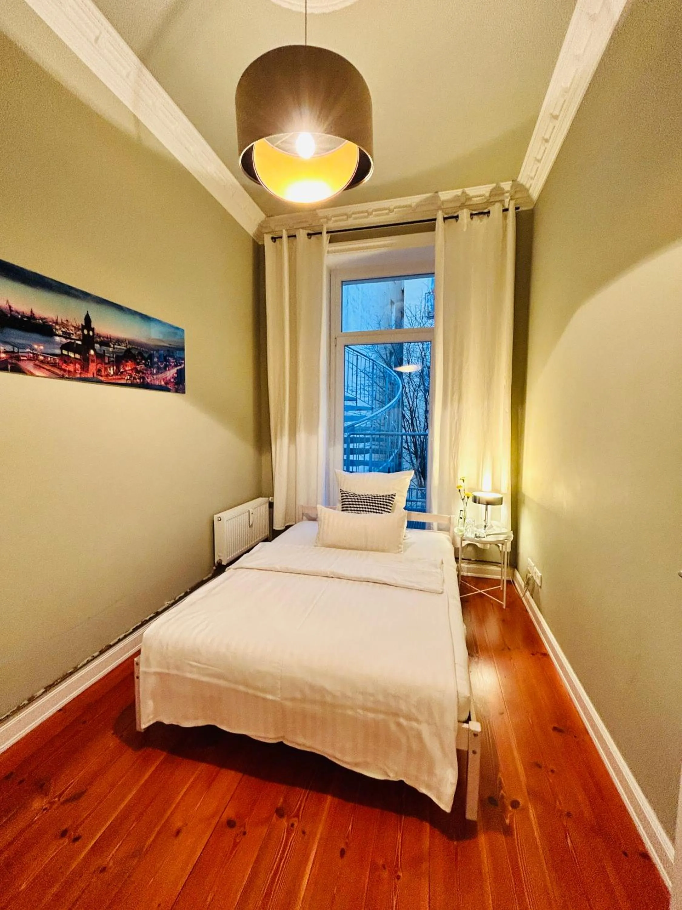 Bed in Blue City Apartment’s