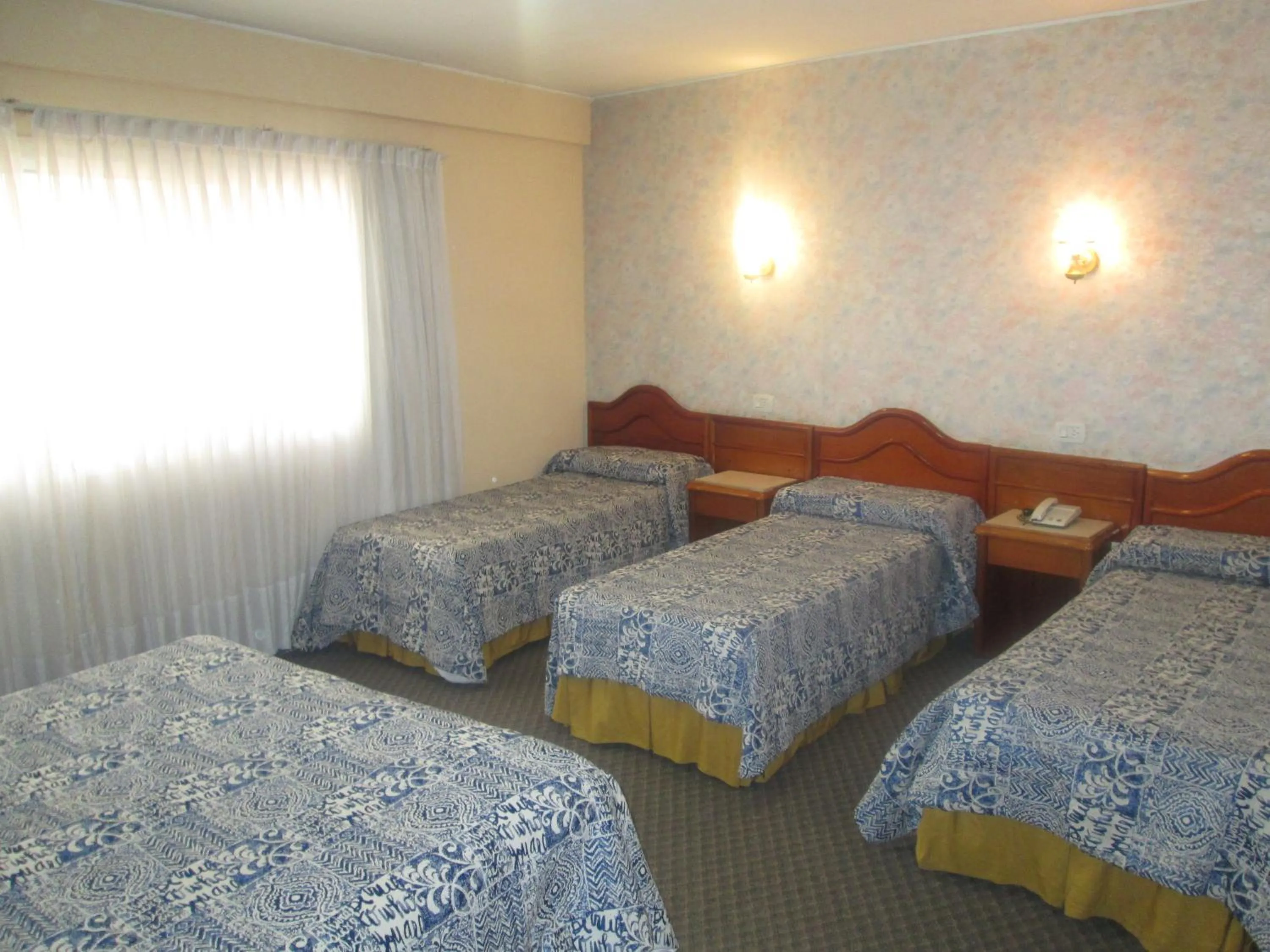 Property building, Bed in Hotel Luey