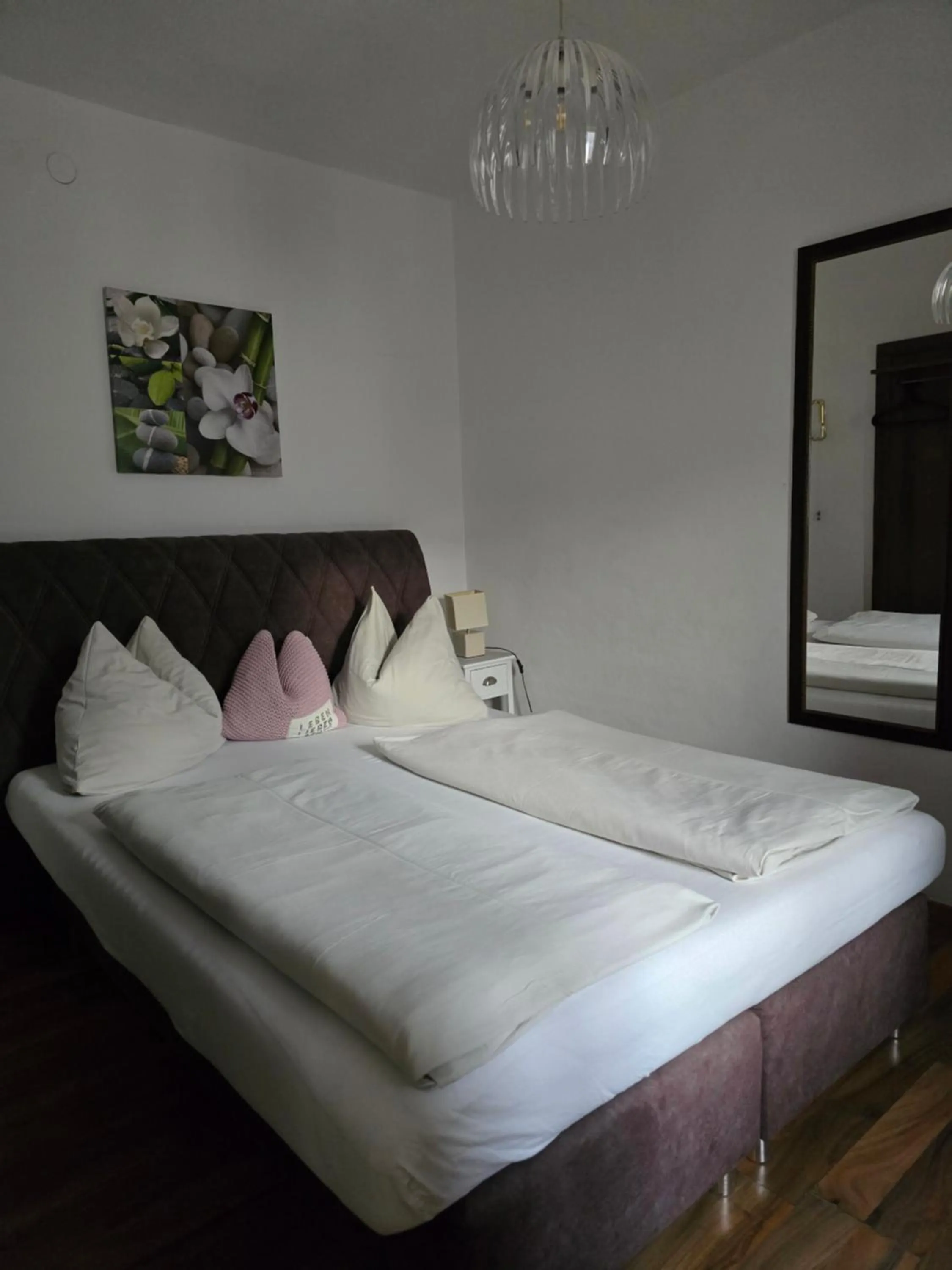 Bed in Hotel Hafnerwirt