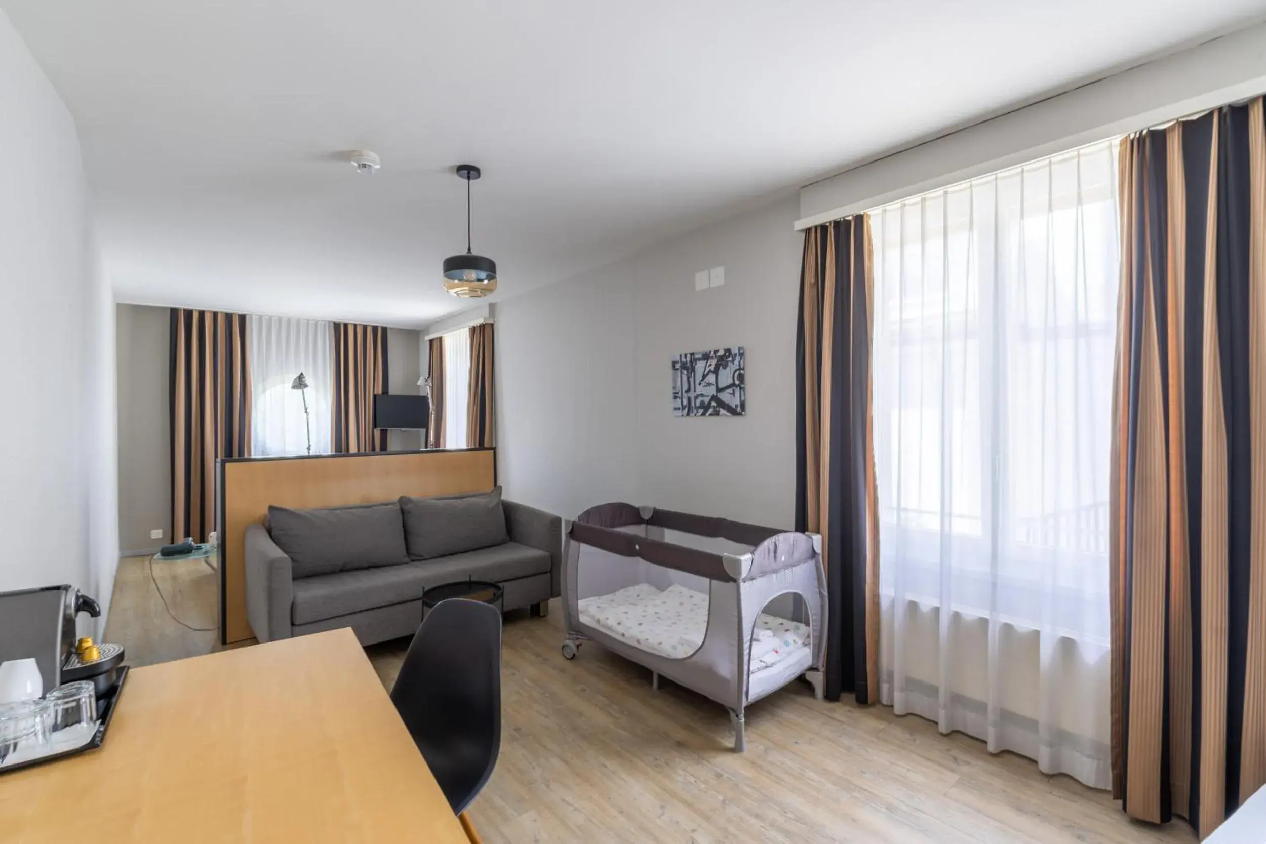 Seating area, Bed in Royal Hotel - Urban Living Seating area, Bed in Royal Hotel - Urban Living