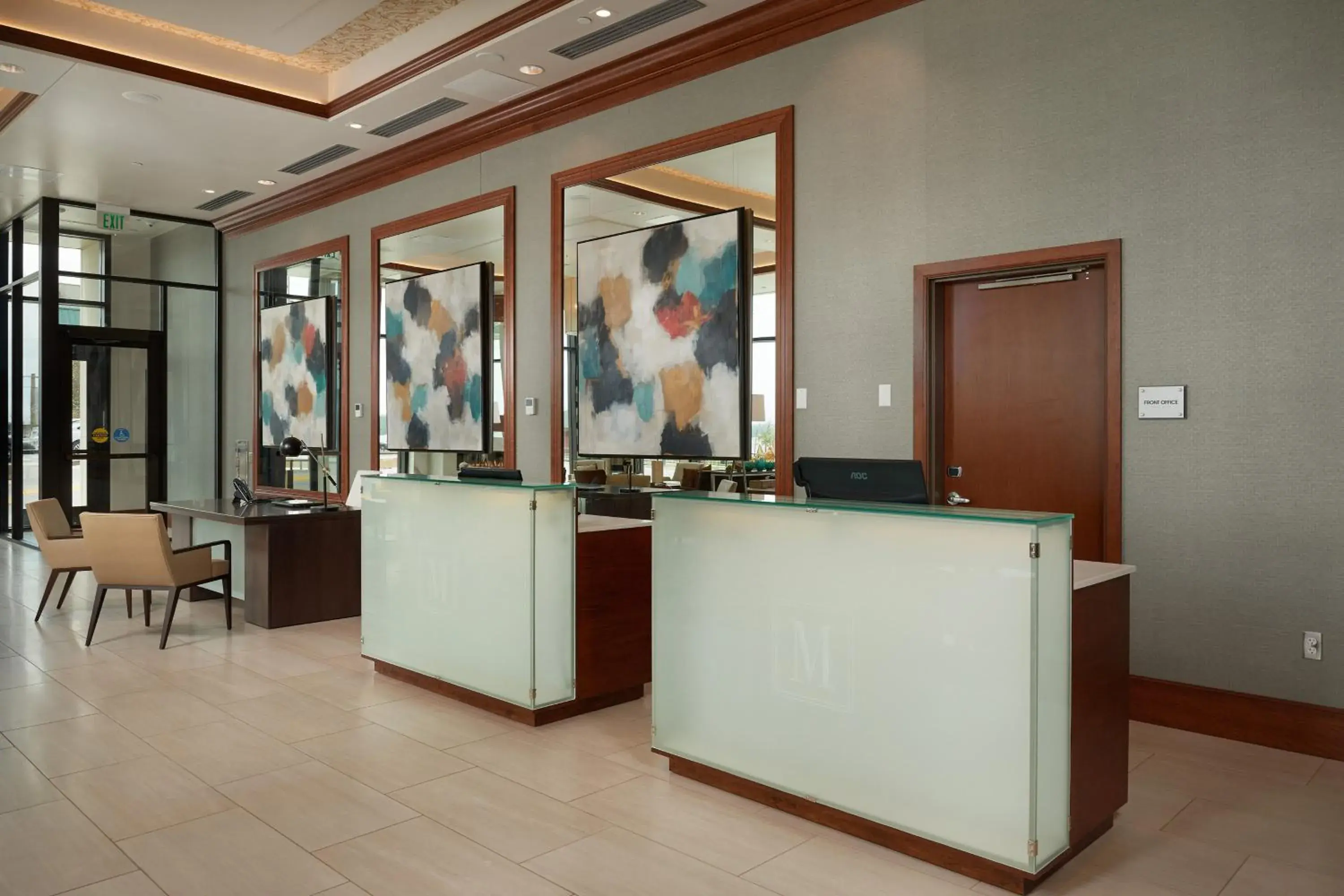 Lobby or reception in The Merrill Hotel & Conference Center, Muscatine, a Tribute Portfolio Hotel Lobby or reception in The Merrill Hotel & Conference Center, Muscatine, a Tribute Portfolio Hotel