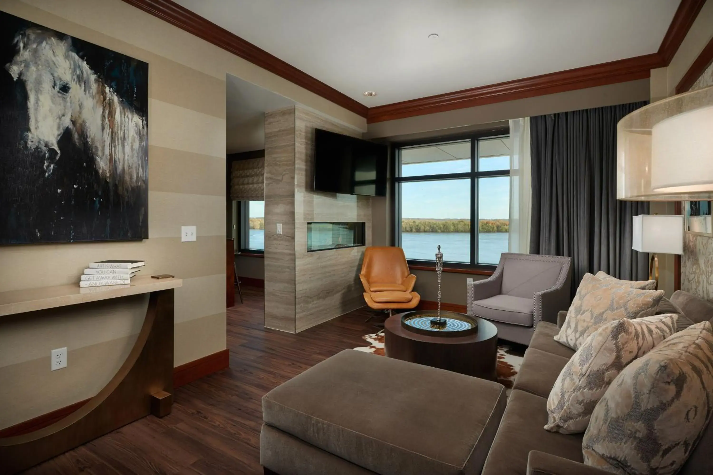 Living room in The Merrill Hotel & Conference Center, Muscatine, a Tribute Portfolio Hotel Living room in The Merrill Hotel & Conference Center, Muscatine, a Tribute Portfolio Hotel