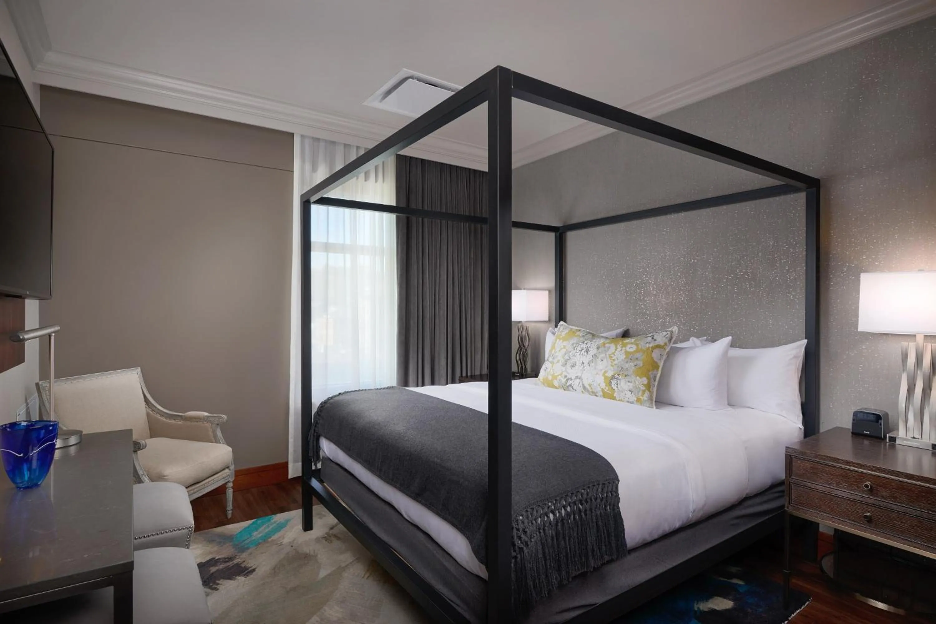 Photo of the whole room, Bed in The Merrill Hotel & Conference Center, Muscatine, a Tribute Portfolio Hotel