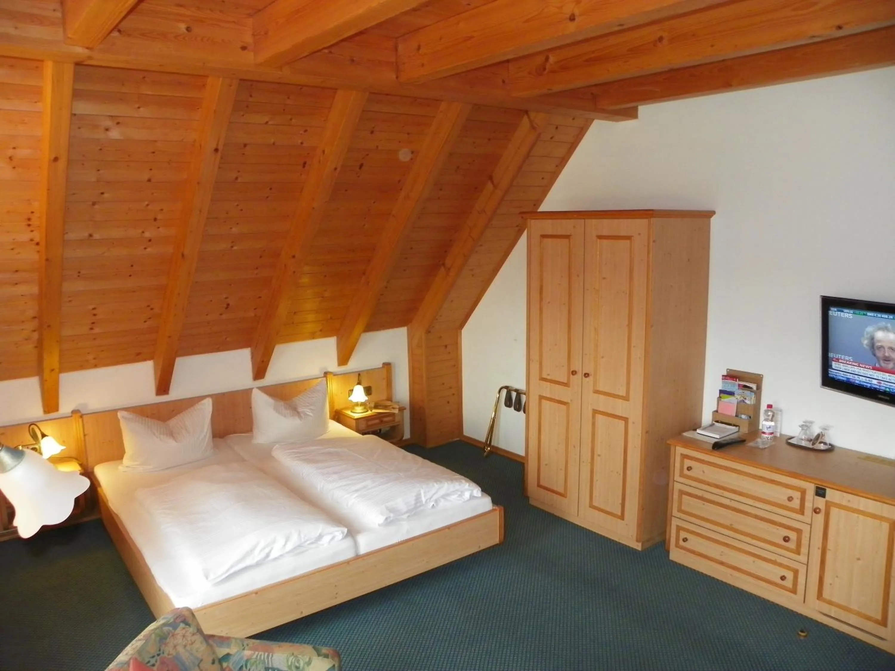 Photo of the whole room, Bed in Landhotel Steigerwaldhaus