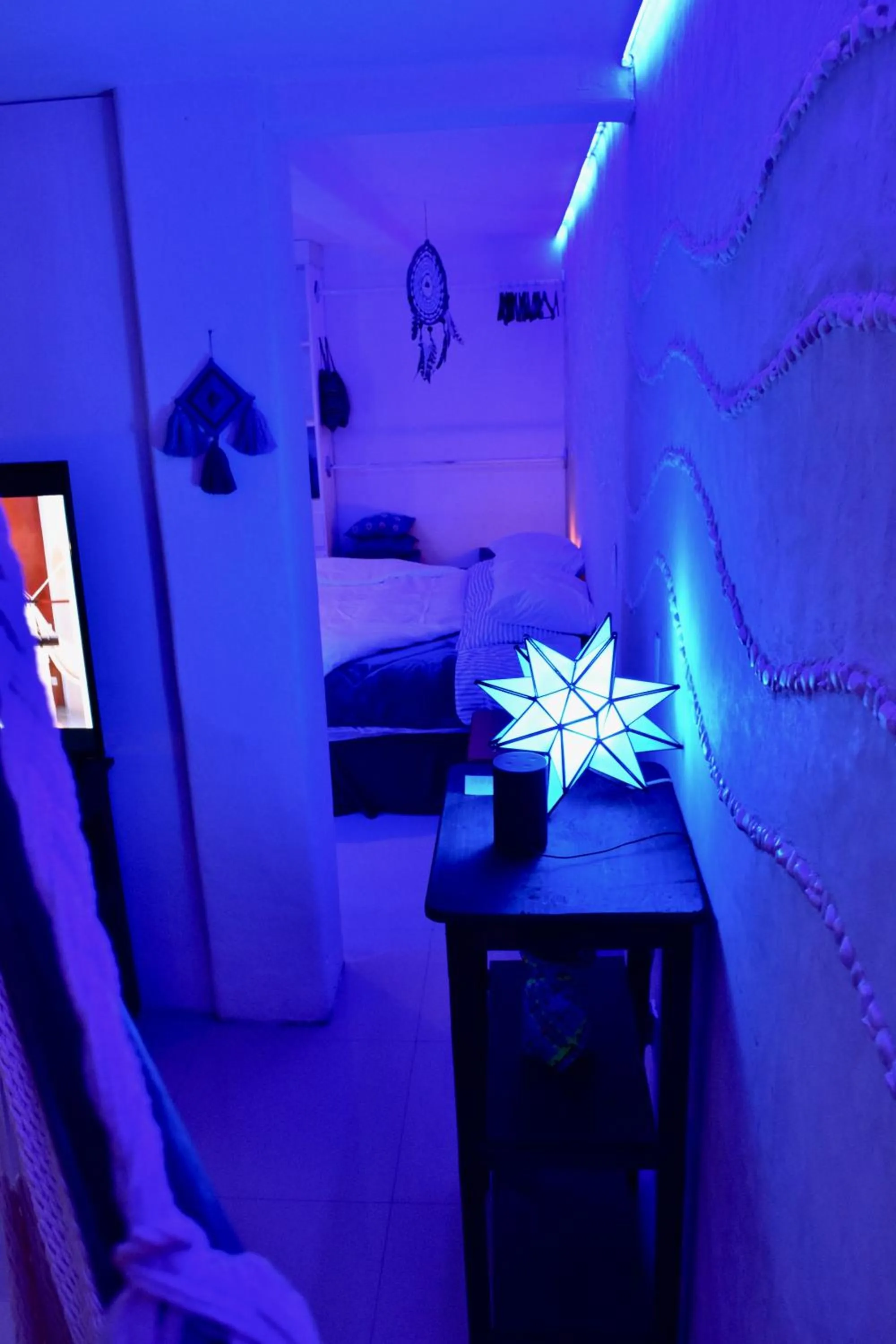 Bed in Magnolias Boutique Suites & SPA