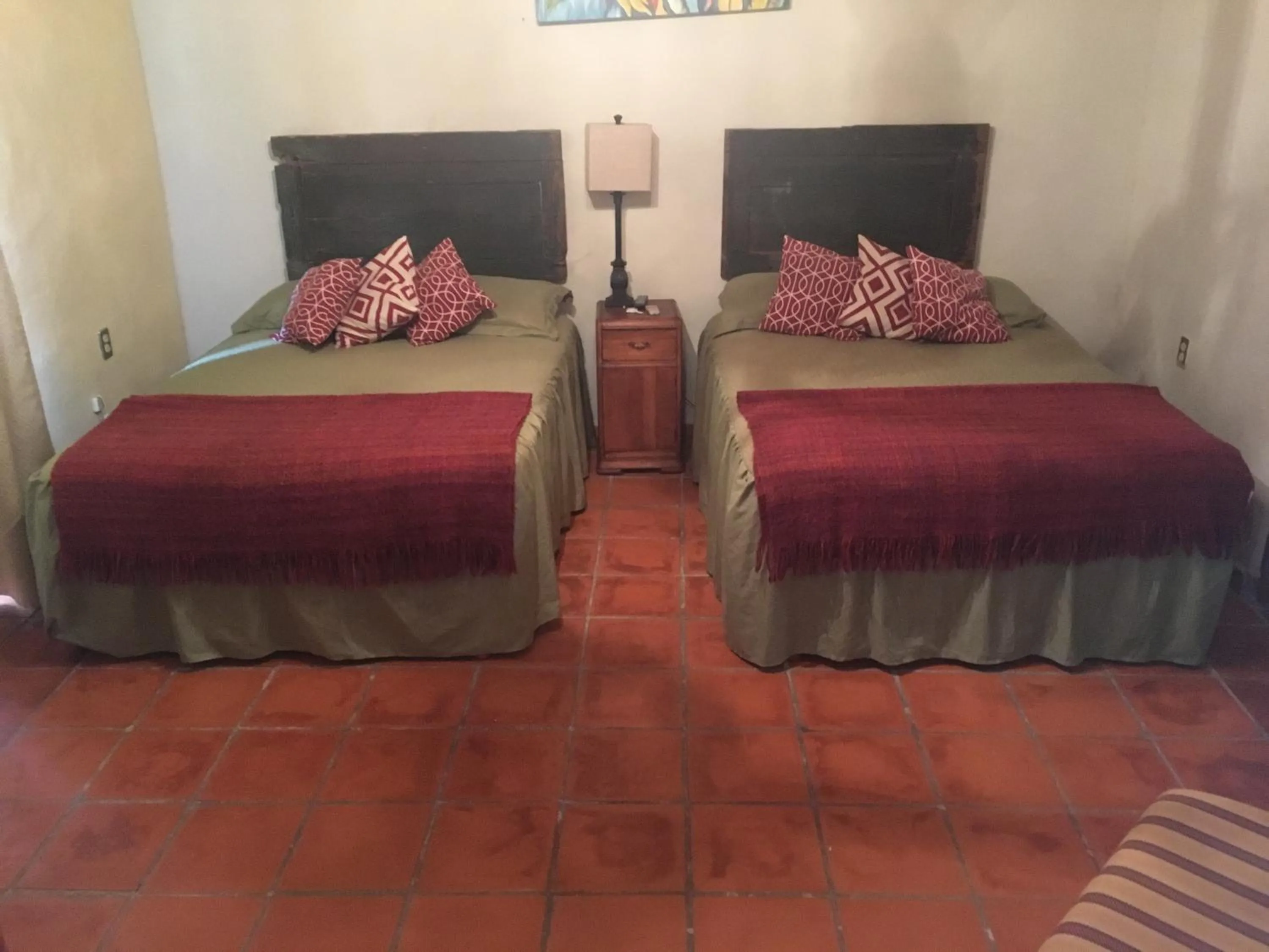 Bed in Hostal Doña Carlota Hotel