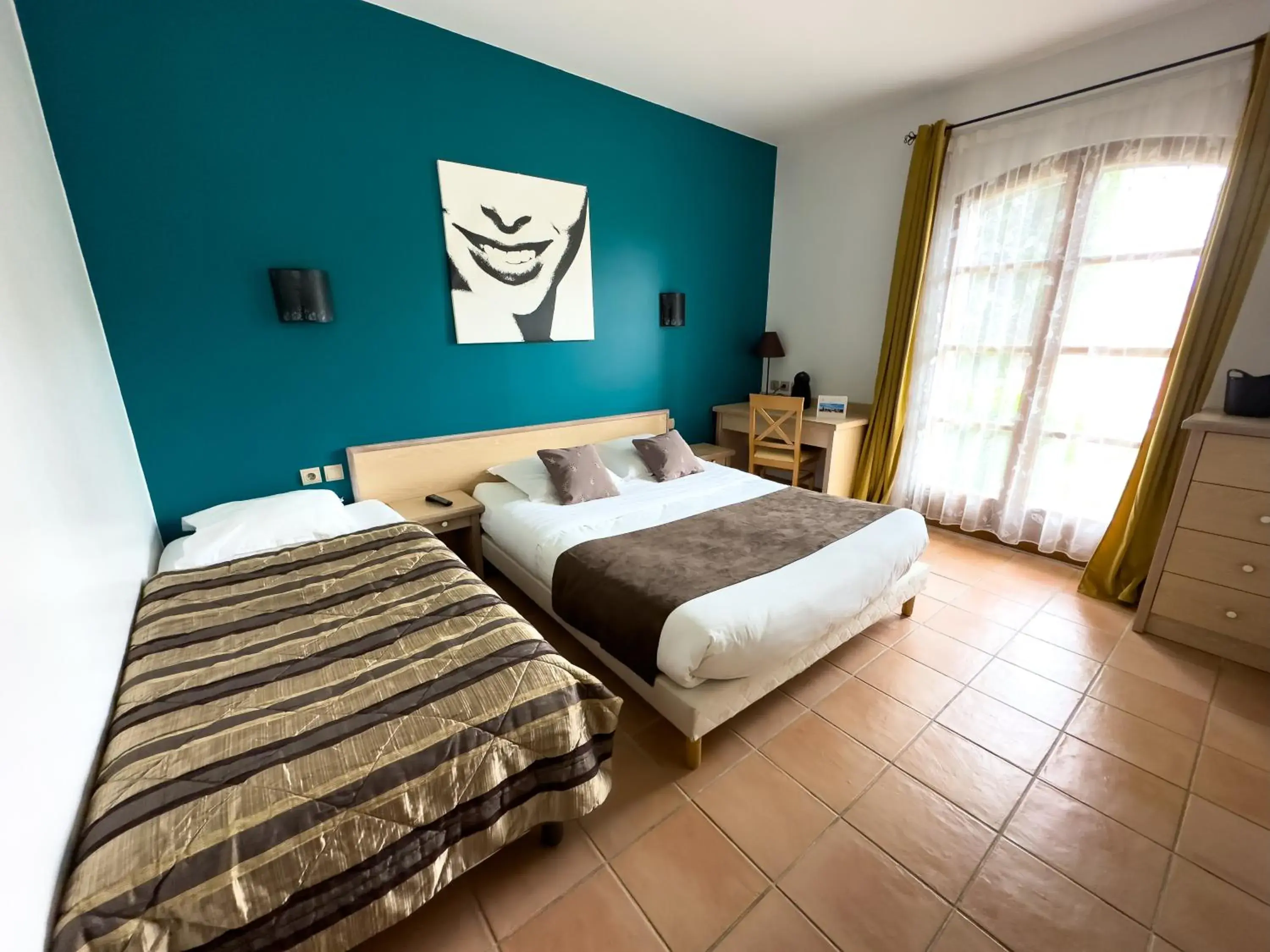 Bed in Hôtel et Restaurant Logis Le Mas de Mon Père Bed in Hôtel et Restaurant Logis Le Mas de Mon Père