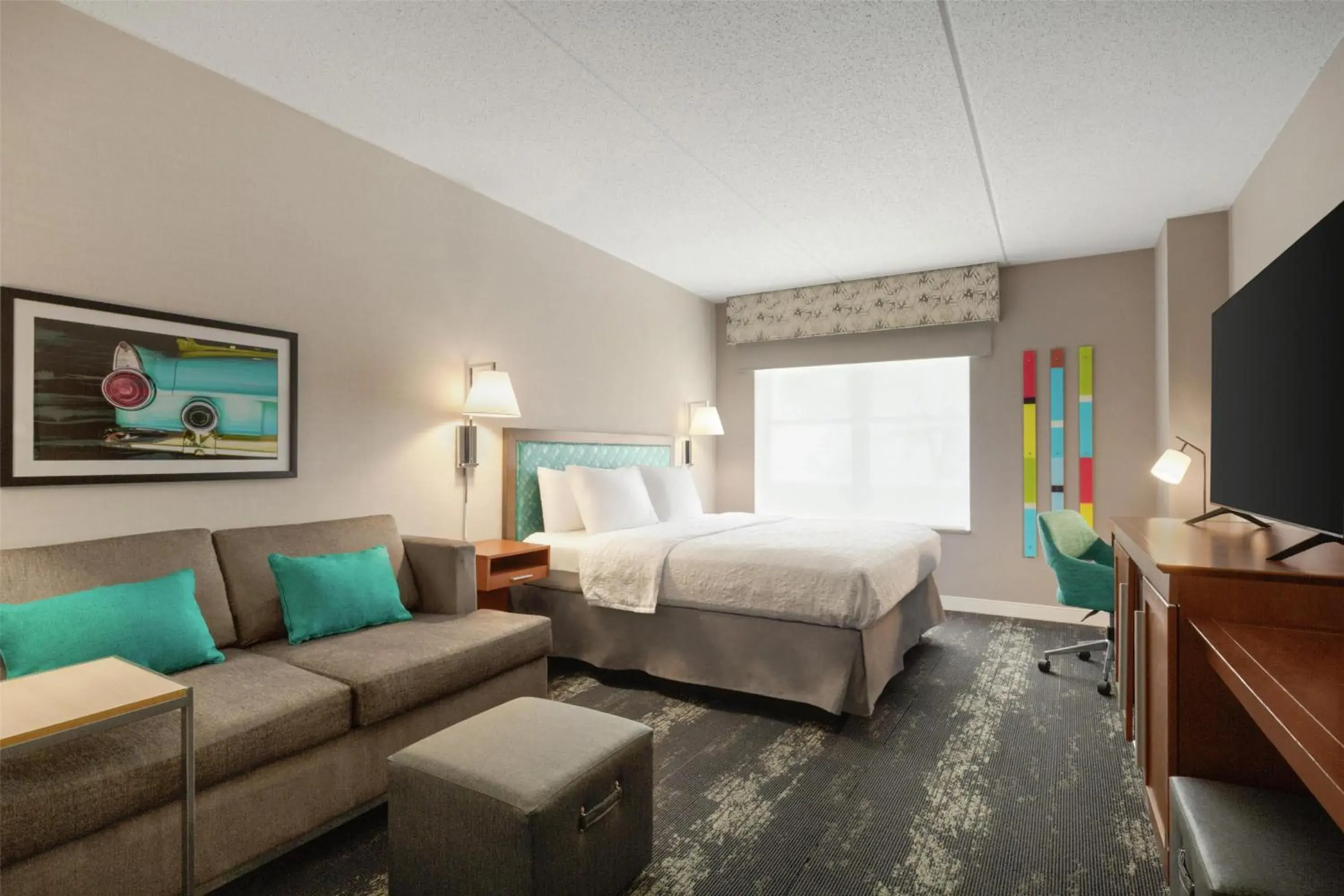 Living room, Bed in Hampton Inn at Tin Lizzie Gaming Resort Living room, Bed in Hampton Inn at Tin Lizzie Gaming Resort