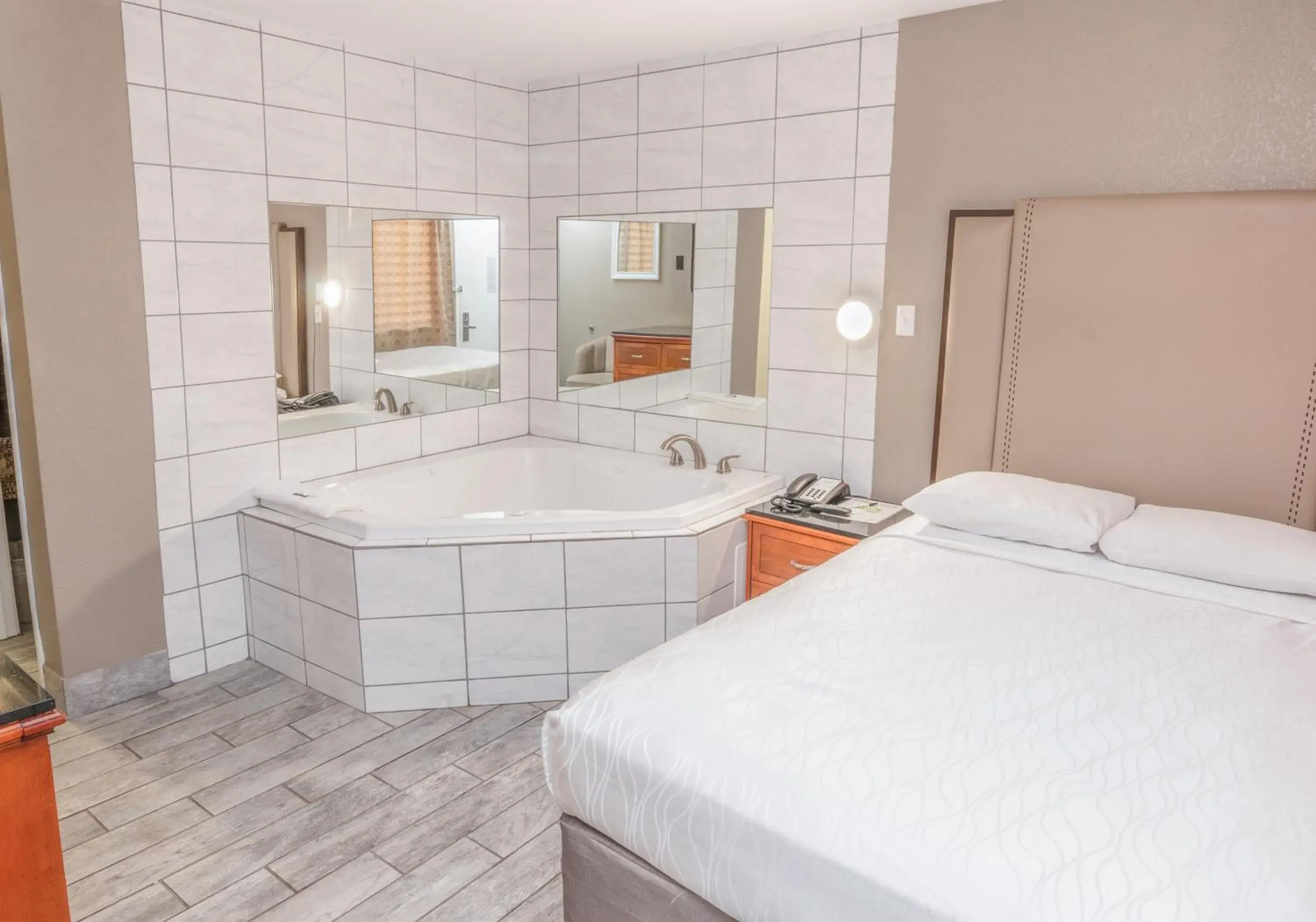 Bed in Budgetel Inn & Suites Bed in Budgetel Inn & Suites