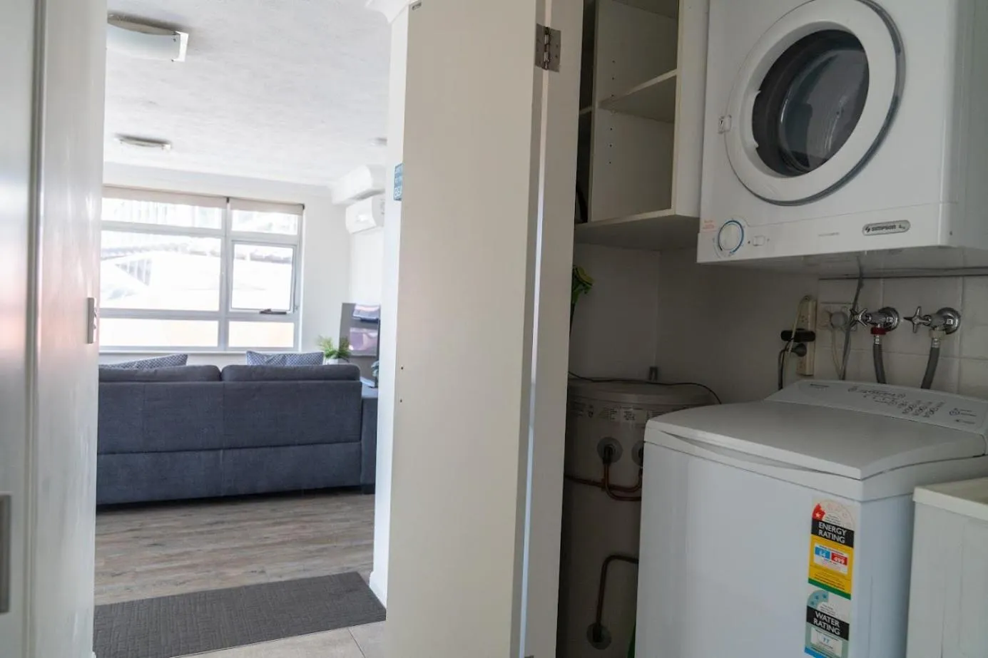 washing machine in Wharf Boutique Apartments