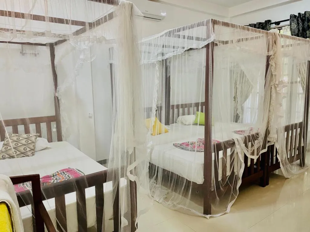 Bedroom, Bed in Gihan Guesthouse