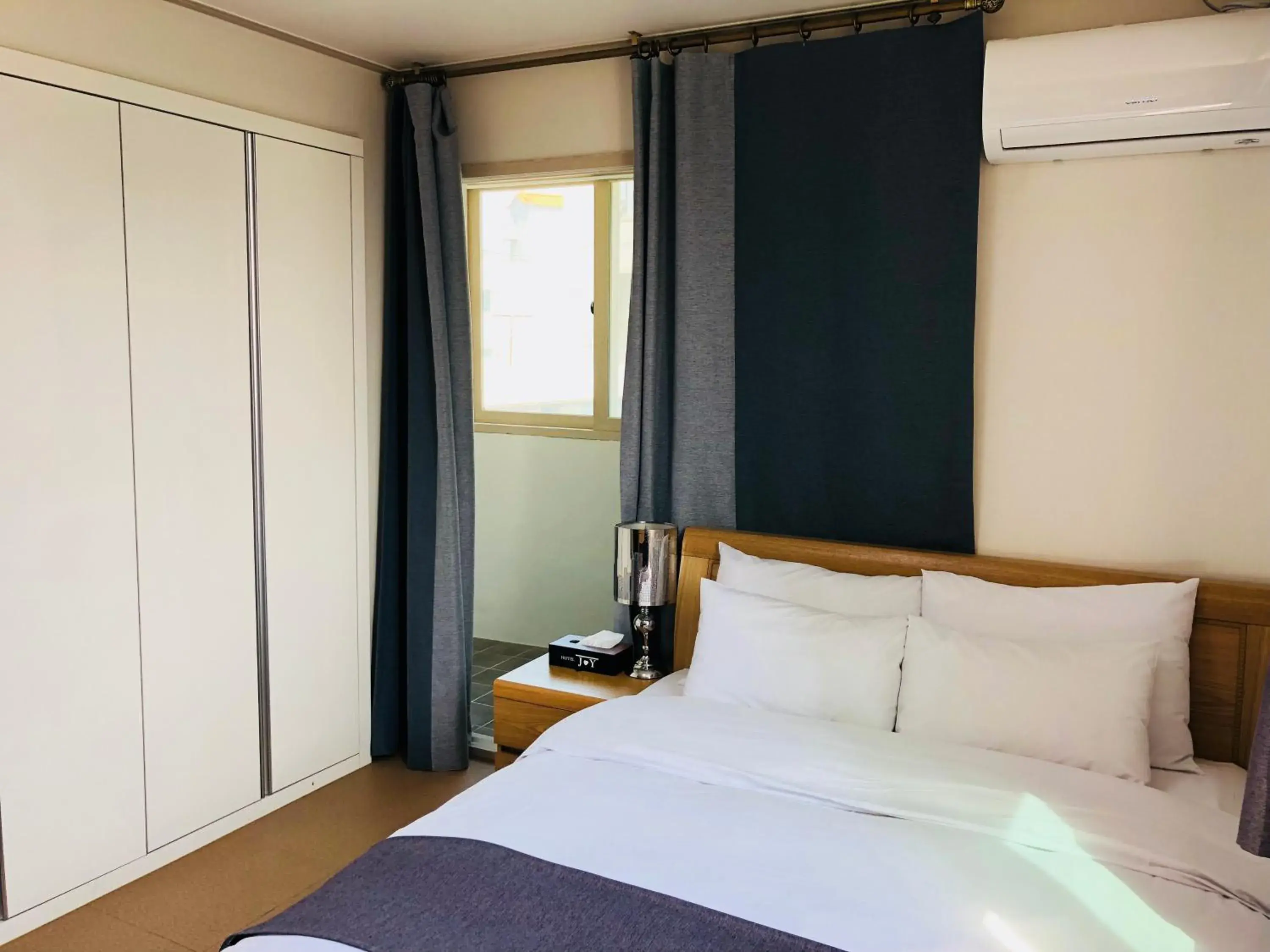 Bed in Hotel Joy near Camp Humphres Bed in Hotel Joy near Camp Humphres