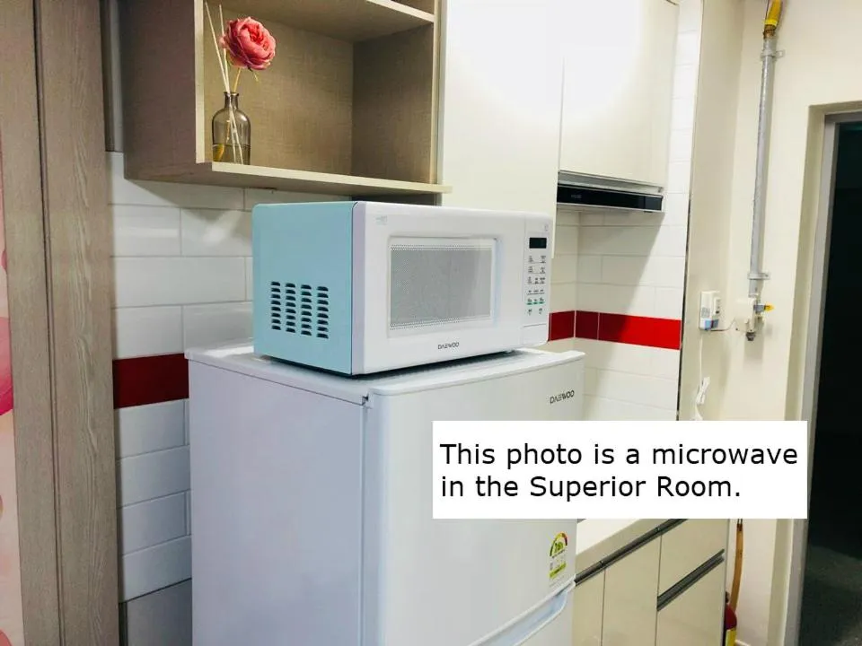 Kitchen or kitchenette in Hotel Joy near Camp Humphres