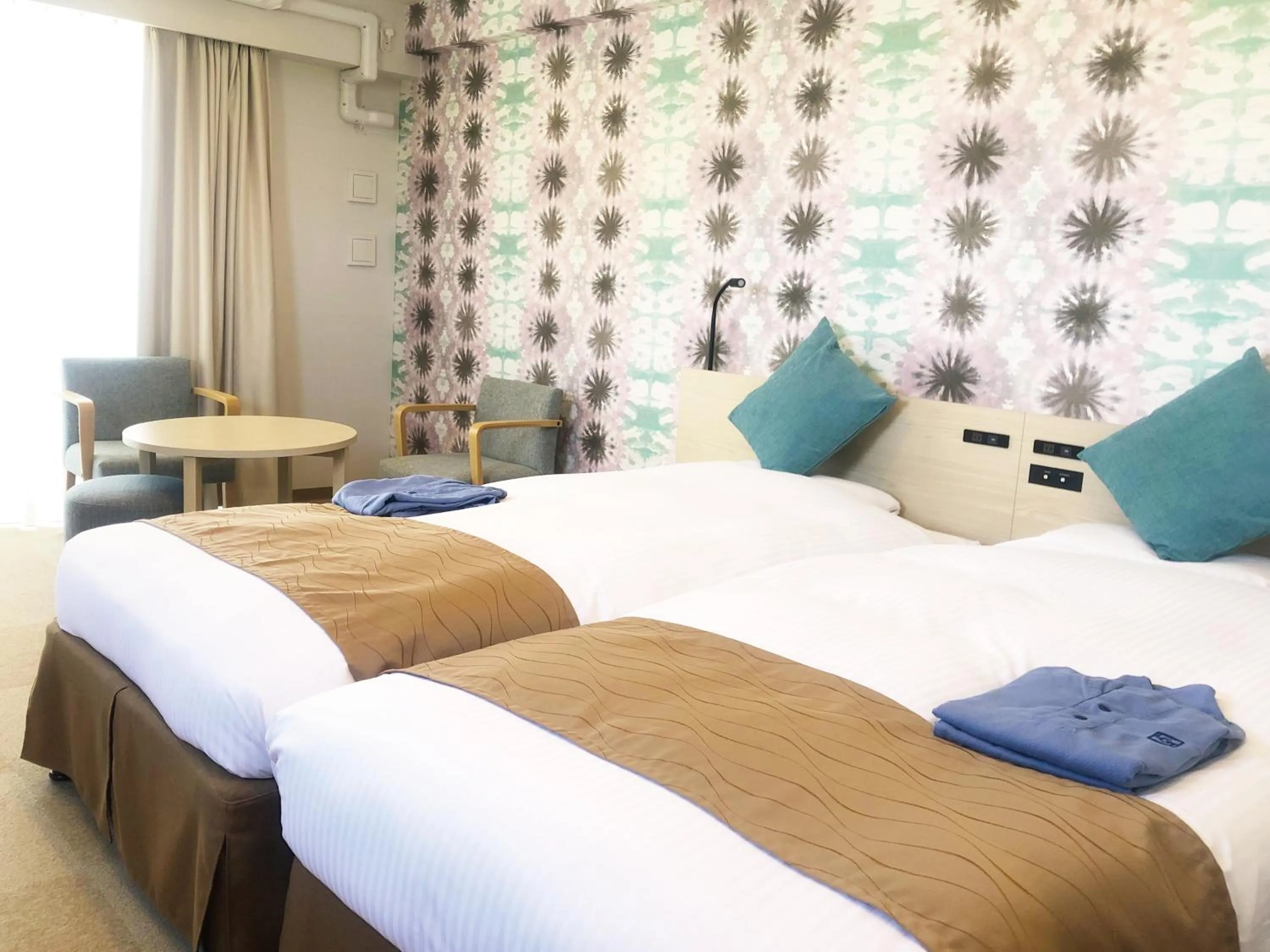 Photo of the whole room, Bed in La'gent Hotel Okinawa Chatan Hotel and Hostel