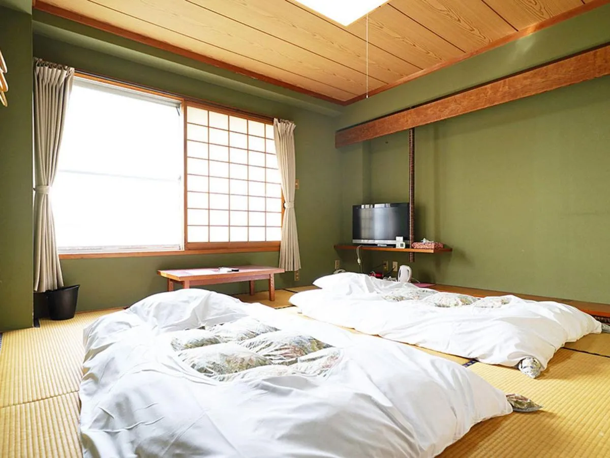 Bed in business ryokan haniwa