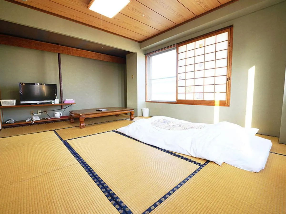 Bed in business ryokan haniwa