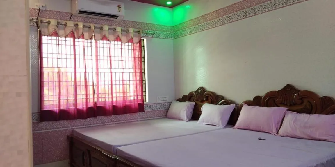 Bed in Sri Priya Lodge