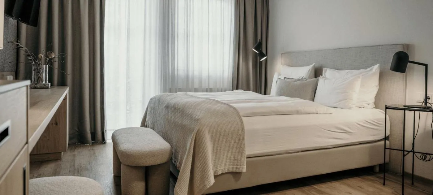 Photo of the whole room, Bed in Sonnhof Alpendorf - an adults only place