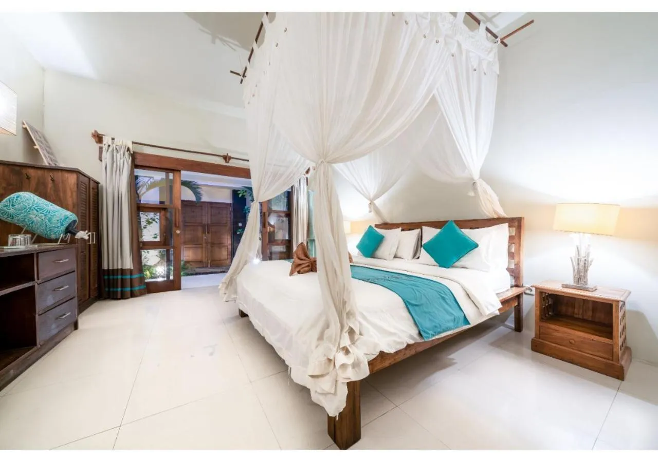 Bed in Tír na nÓg Beachfront Resort