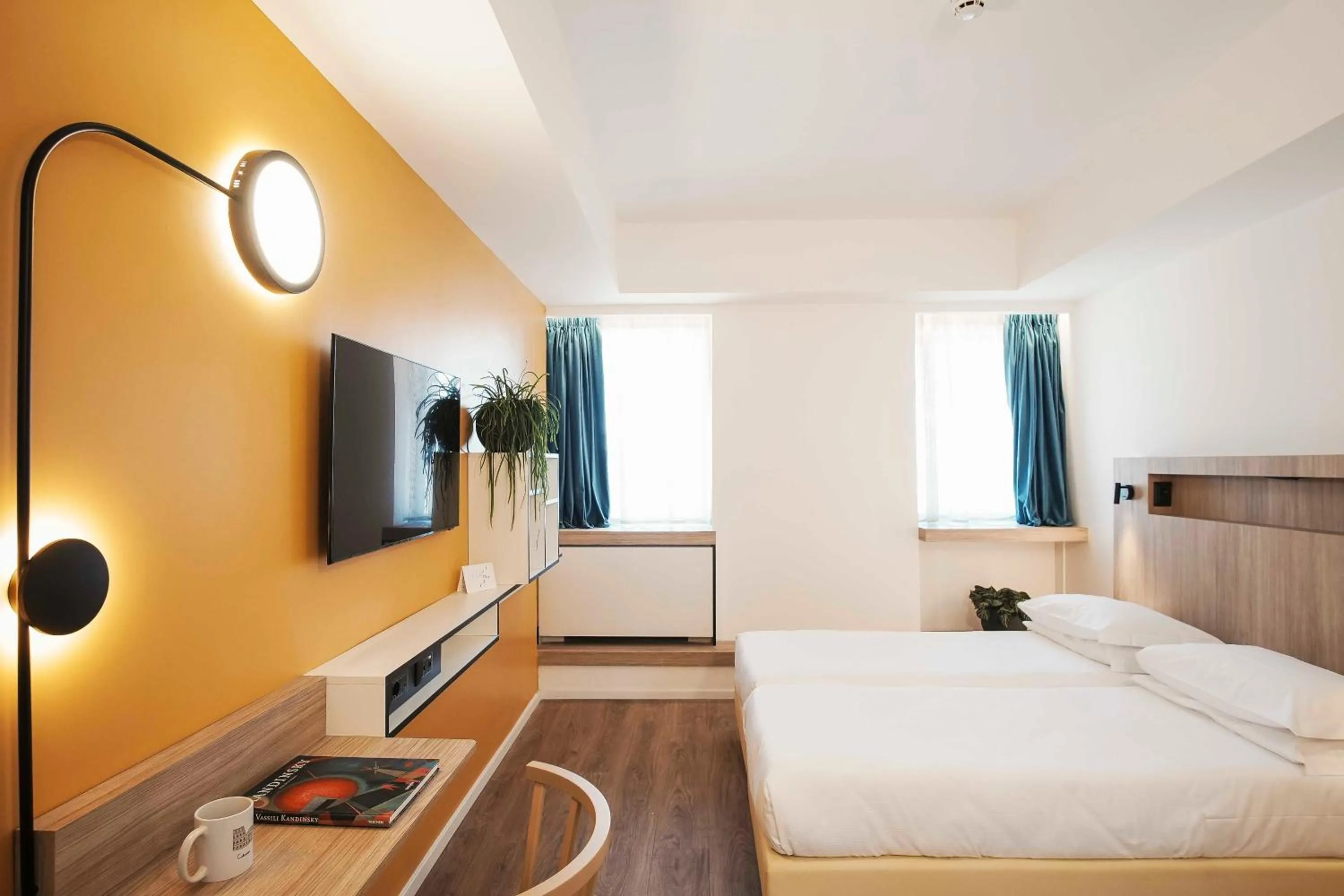 Bed in Aparthotel Colombo Roma