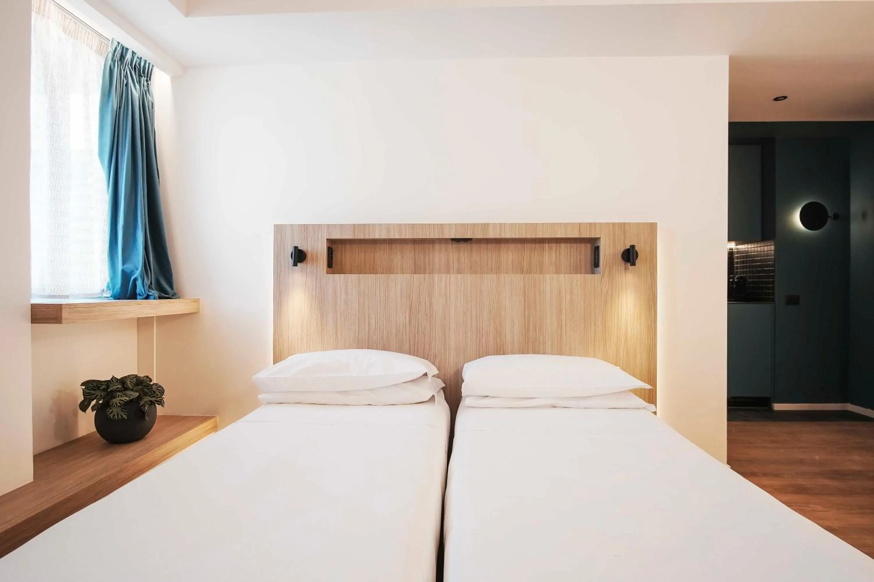 Bed in Aparthotel Colombo Roma