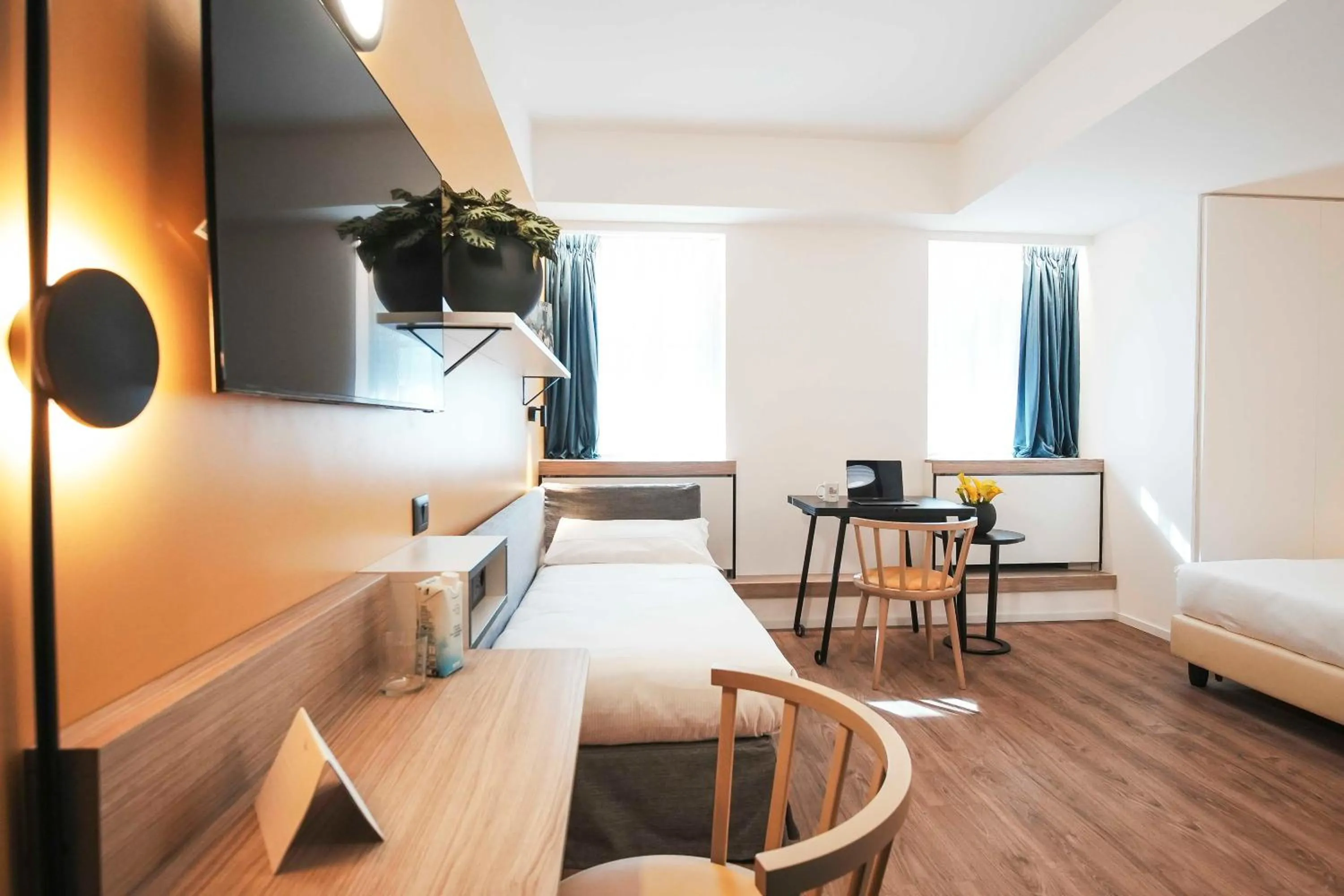 Bed in Aparthotel Colombo Roma