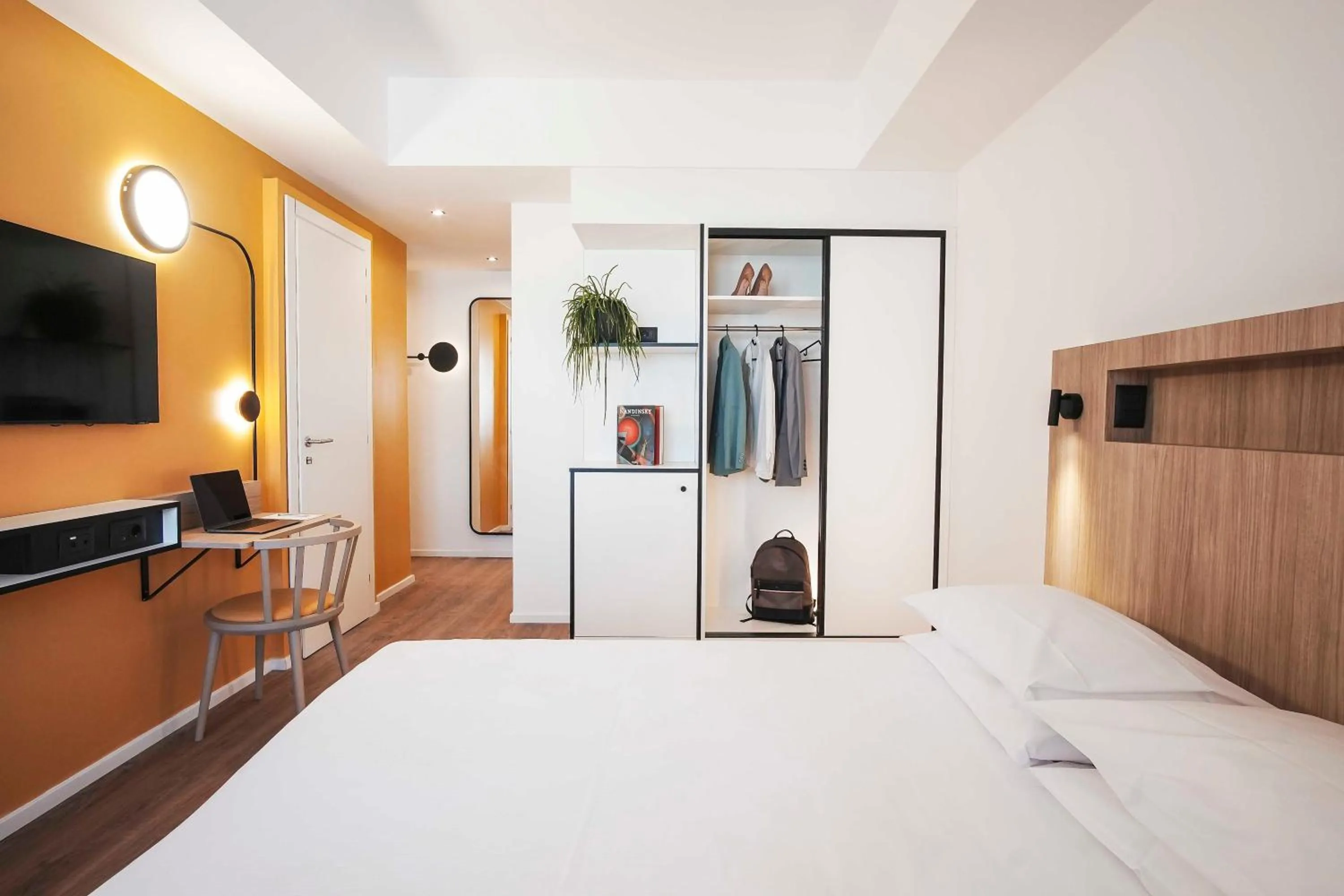 Bed in Aparthotel Colombo Roma