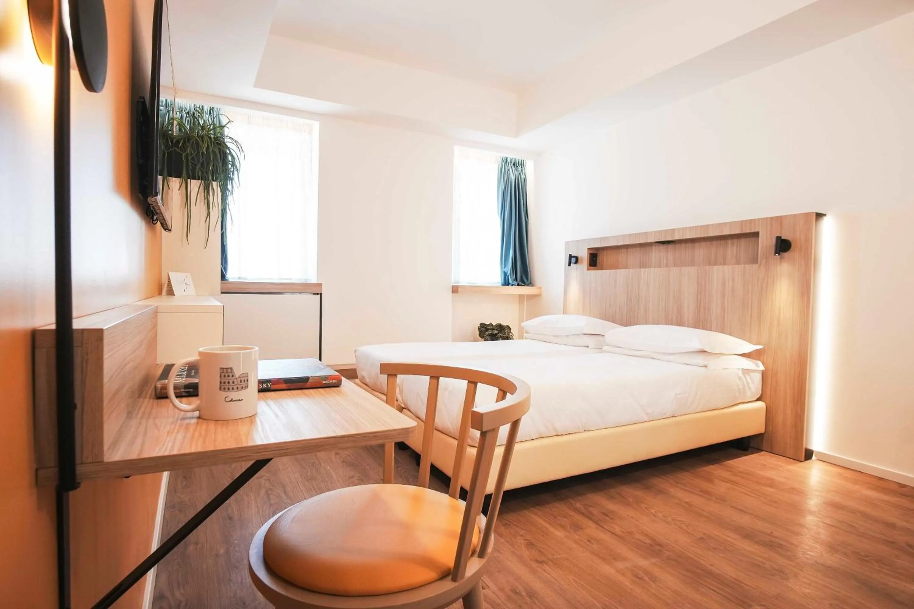 Bed in Aparthotel Colombo Roma