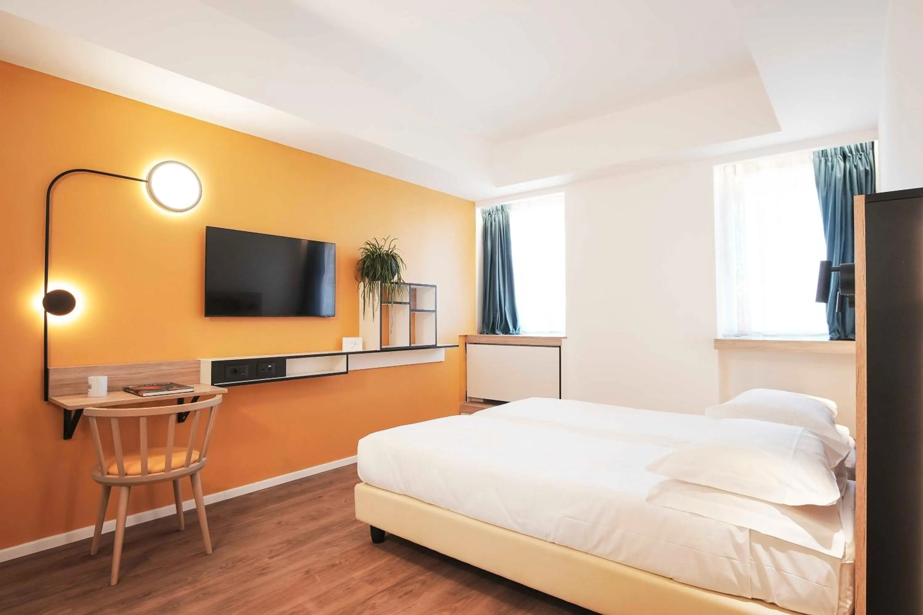 Bed in Aparthotel Colombo Roma