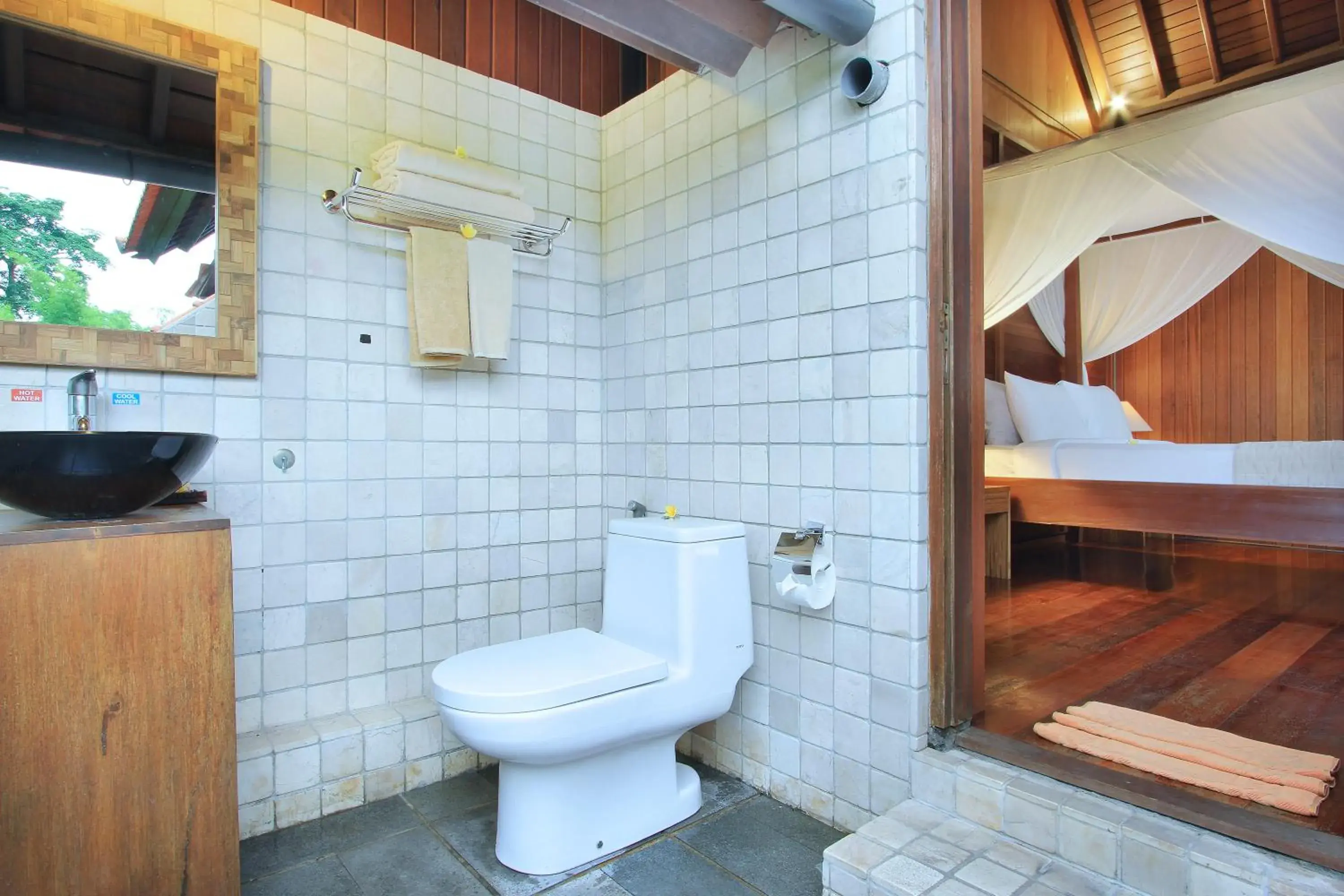 Toilet in Sarin Ubud Suites by GenuineHost Toilet in Sarin Ubud Suites by GenuineHost