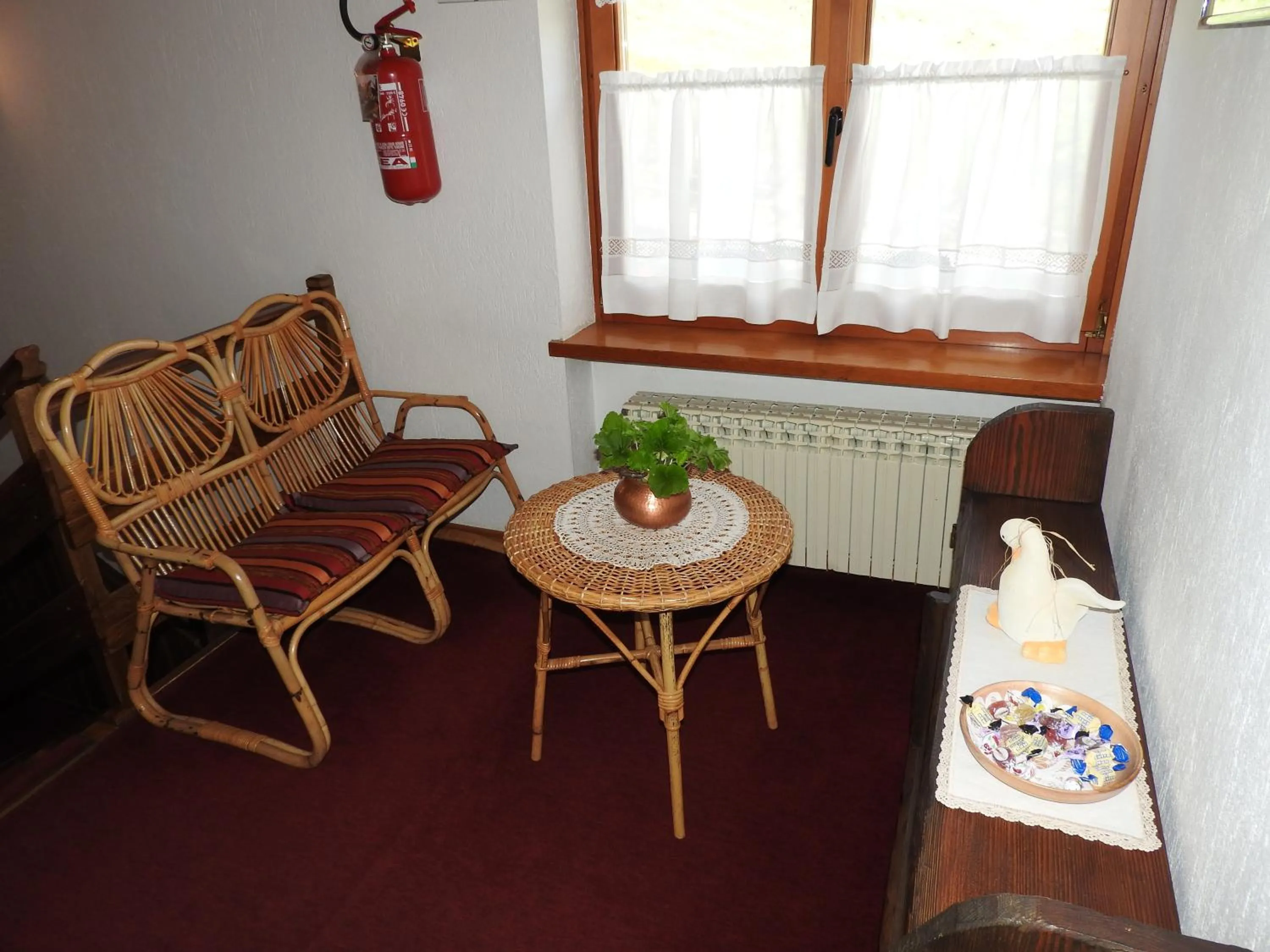 Communal lounge/ TV room in Hotel Le Clocher