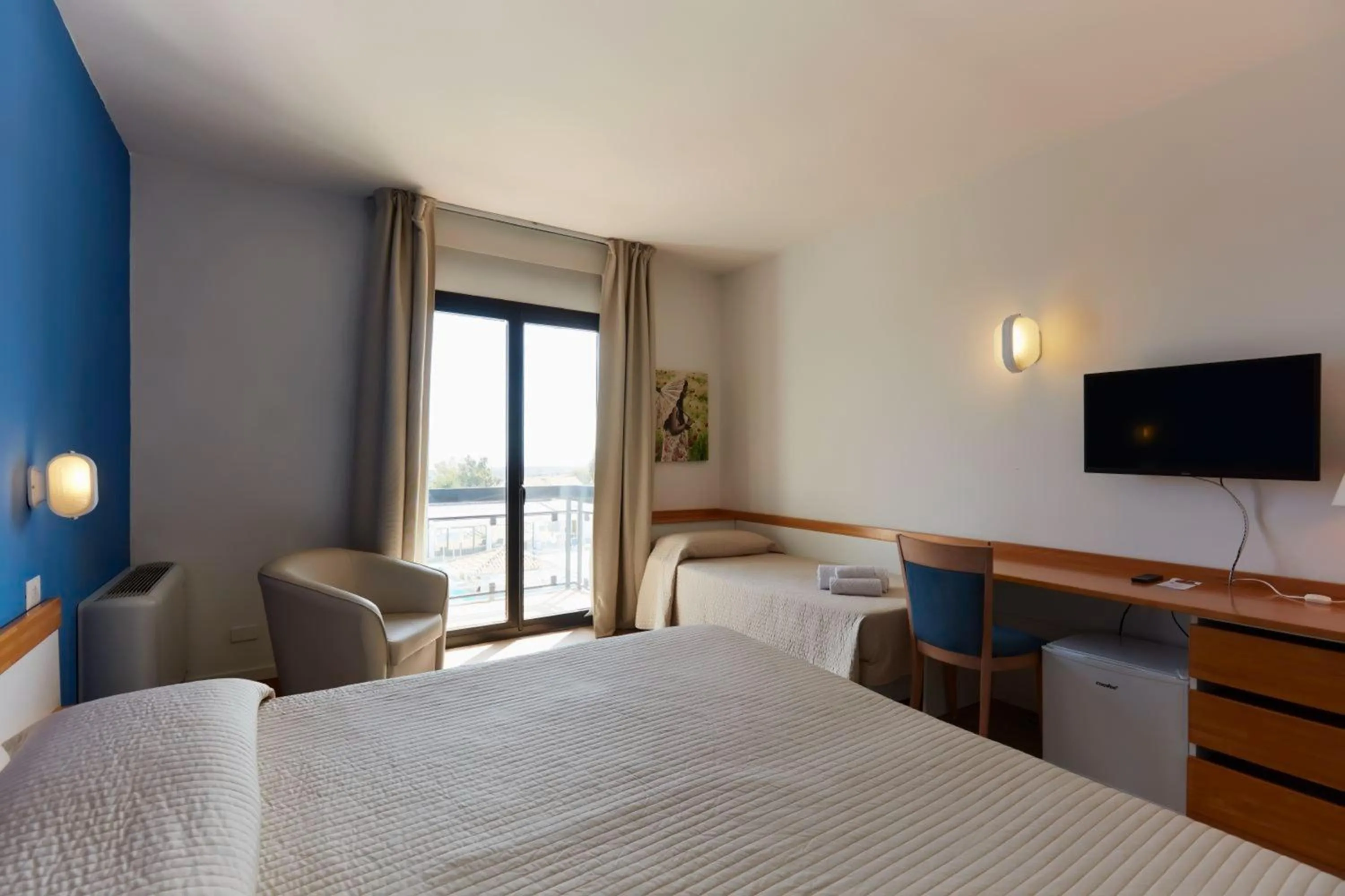TV and multimedia, Bed in I Giardini di Athena- Athena Resort