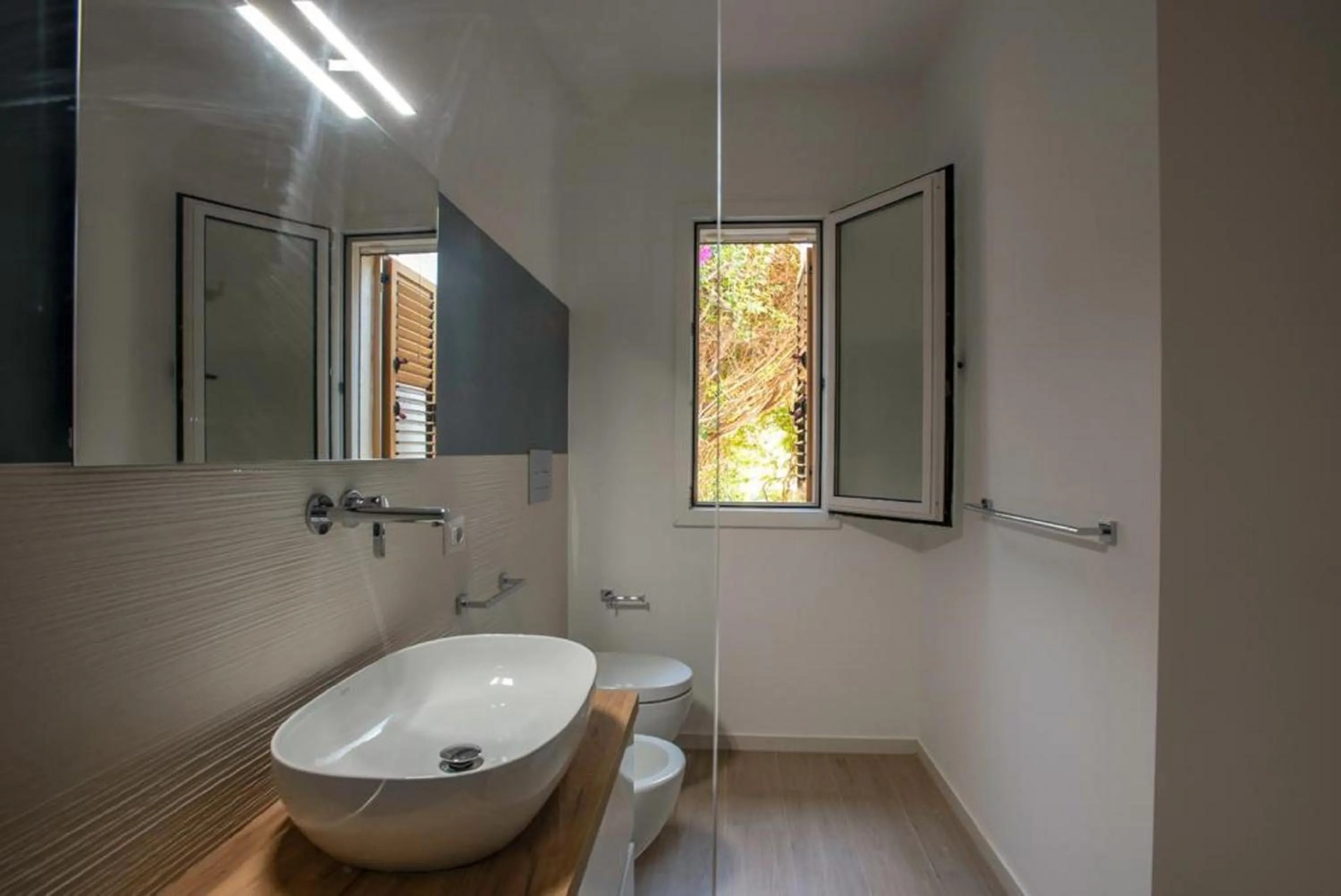 Bathroom in I Giardini di Athena- Athena Resort